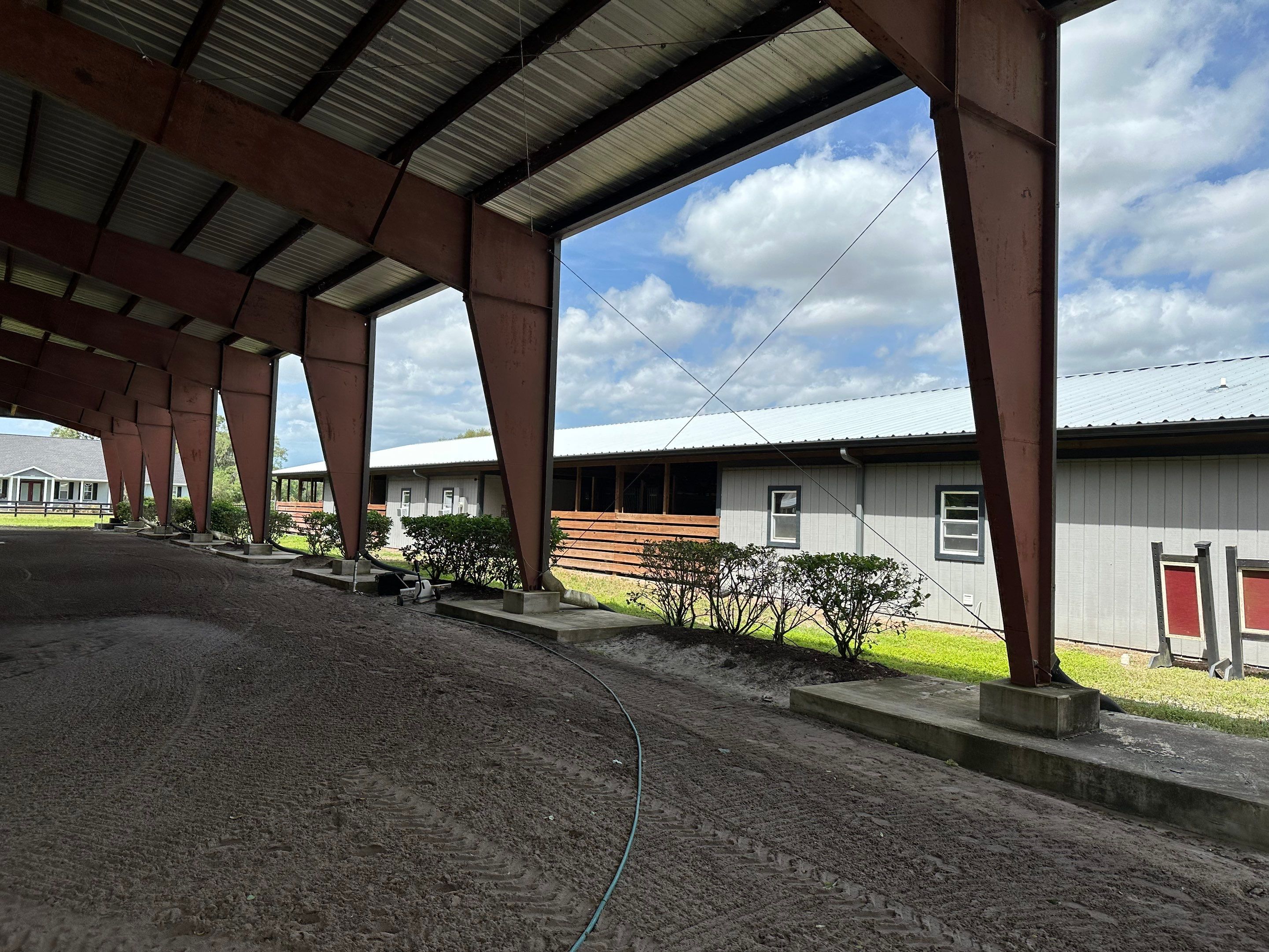 Vinyl Horse Fence & Concrete Pier Cleaning at Lesley Cox Equestrian, Parrish, FL | Sunshine AquaWash by Sunshine AquaWash