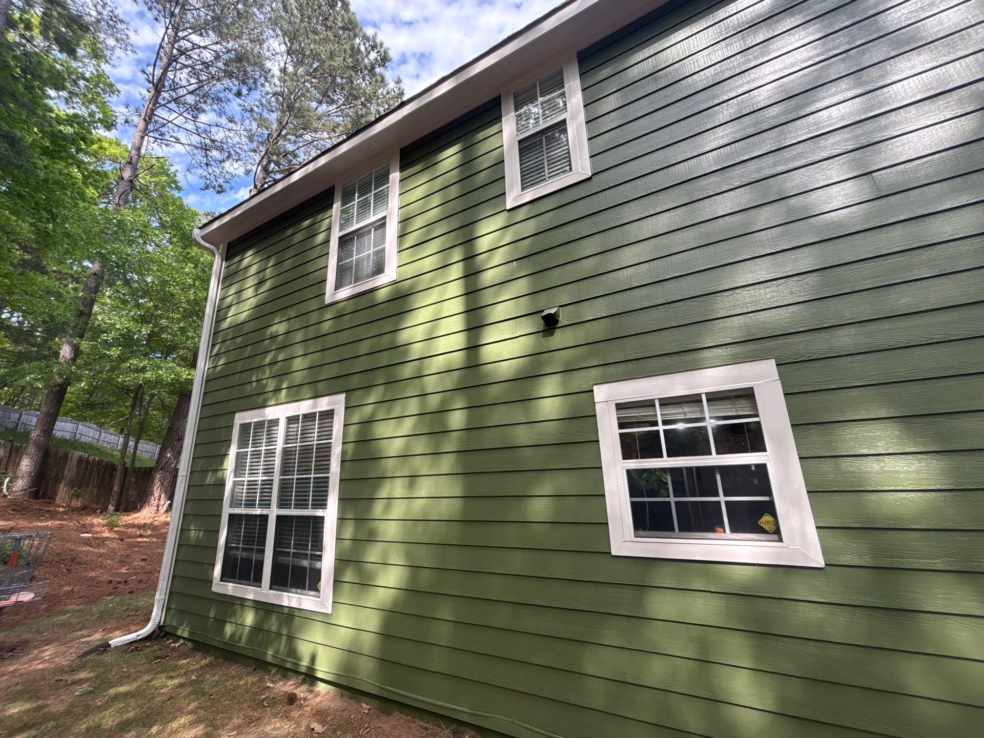 Green Exterior Paint and James Hardie Siding Transformation in Smyrna, GA by Nelson Exteriors 