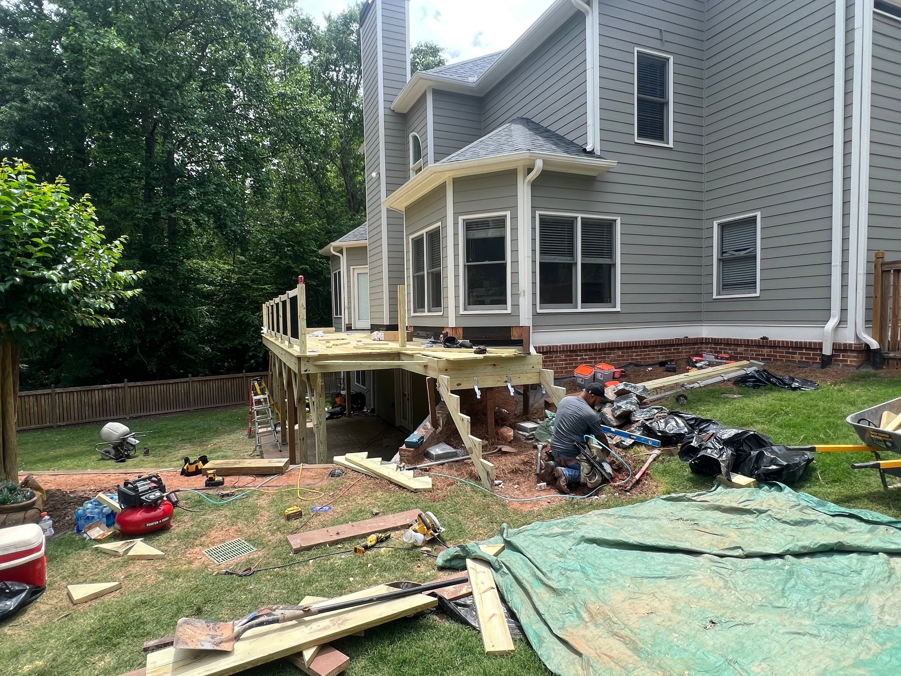 Elevated Wood Deck Replacement and Staircase Installation in Woodstock by Swift Home Renovations