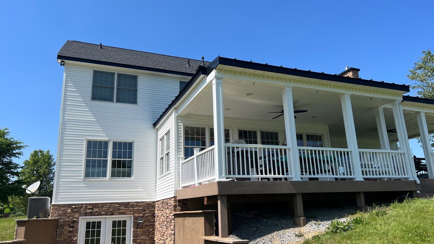 Roof Damage using Certainteed Lifetime Roofing System- Moire Black Landmark Pro shingkes with shadow ridge caps. by BulletpROOF Exteriors