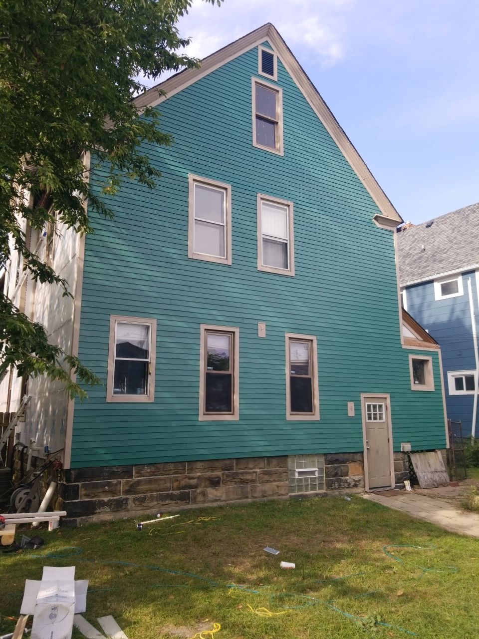 James Hardie Siding on Antique Home by Absolute Roofing and Construction
