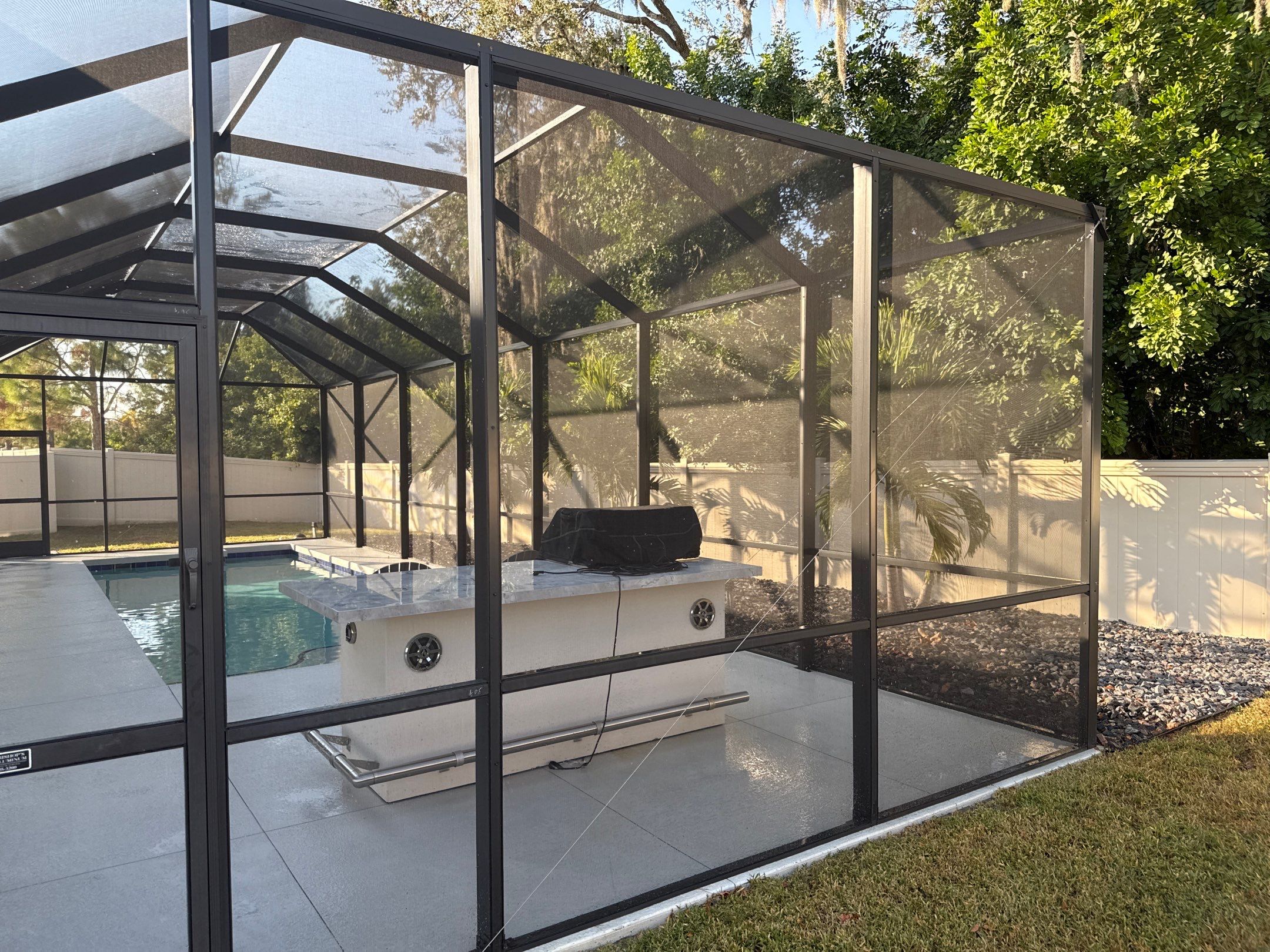Painted Pool Deck & Screen Enclosure Cleaning | Heron Creek, Palmetto FL by Sunshine AquaWash
