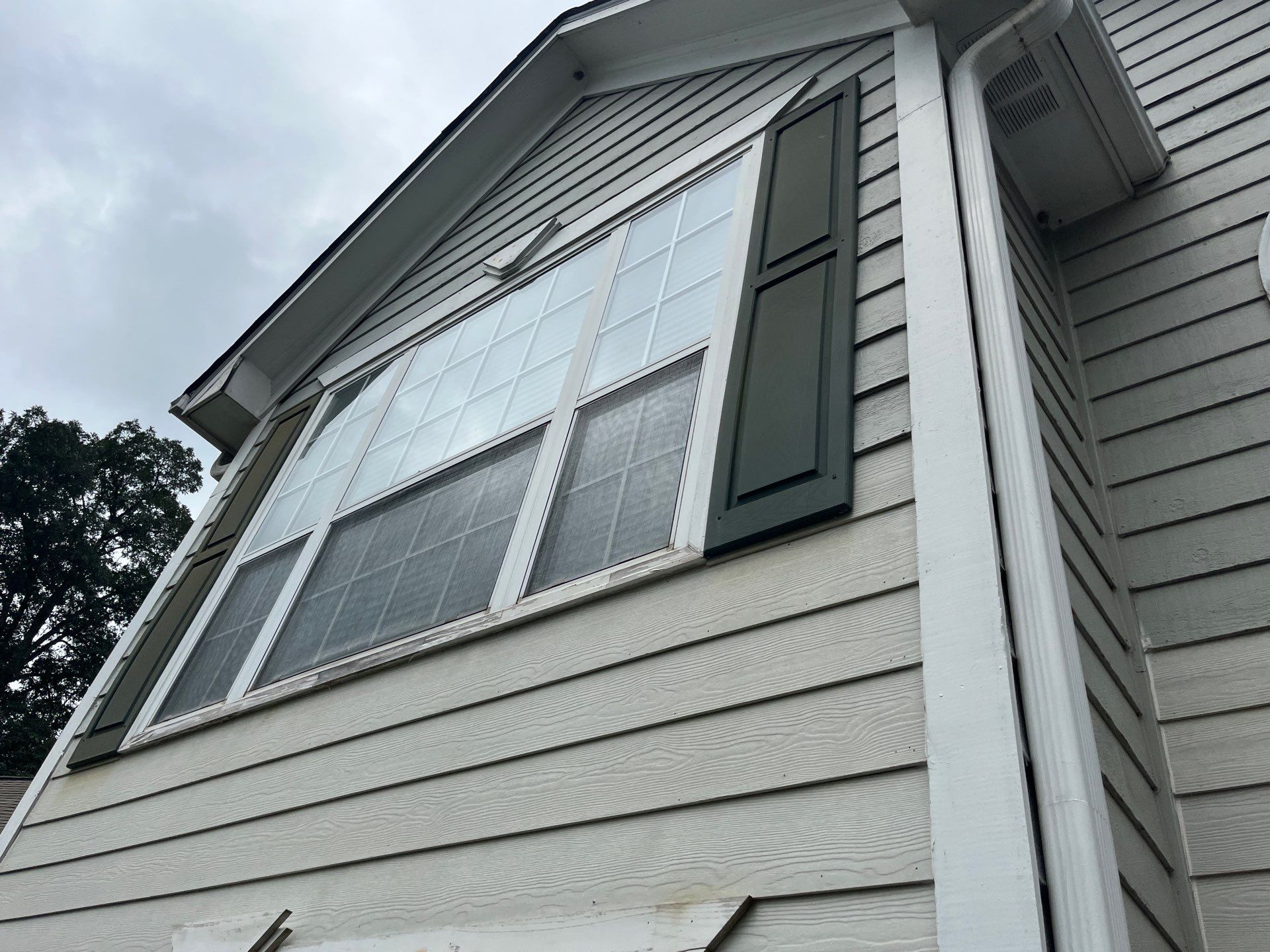 Lawrenceville, GA Full Siding Replacement, Exterior Painting, and Window Installation by Nelson Exteriors 