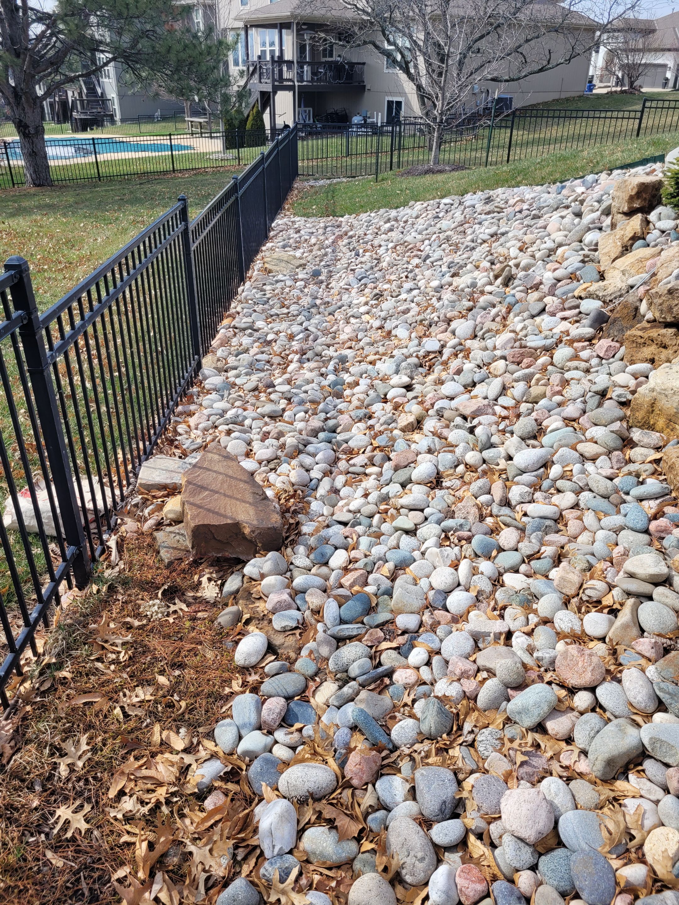 Pool Retaining Wall by LAND ESCAPES LLC