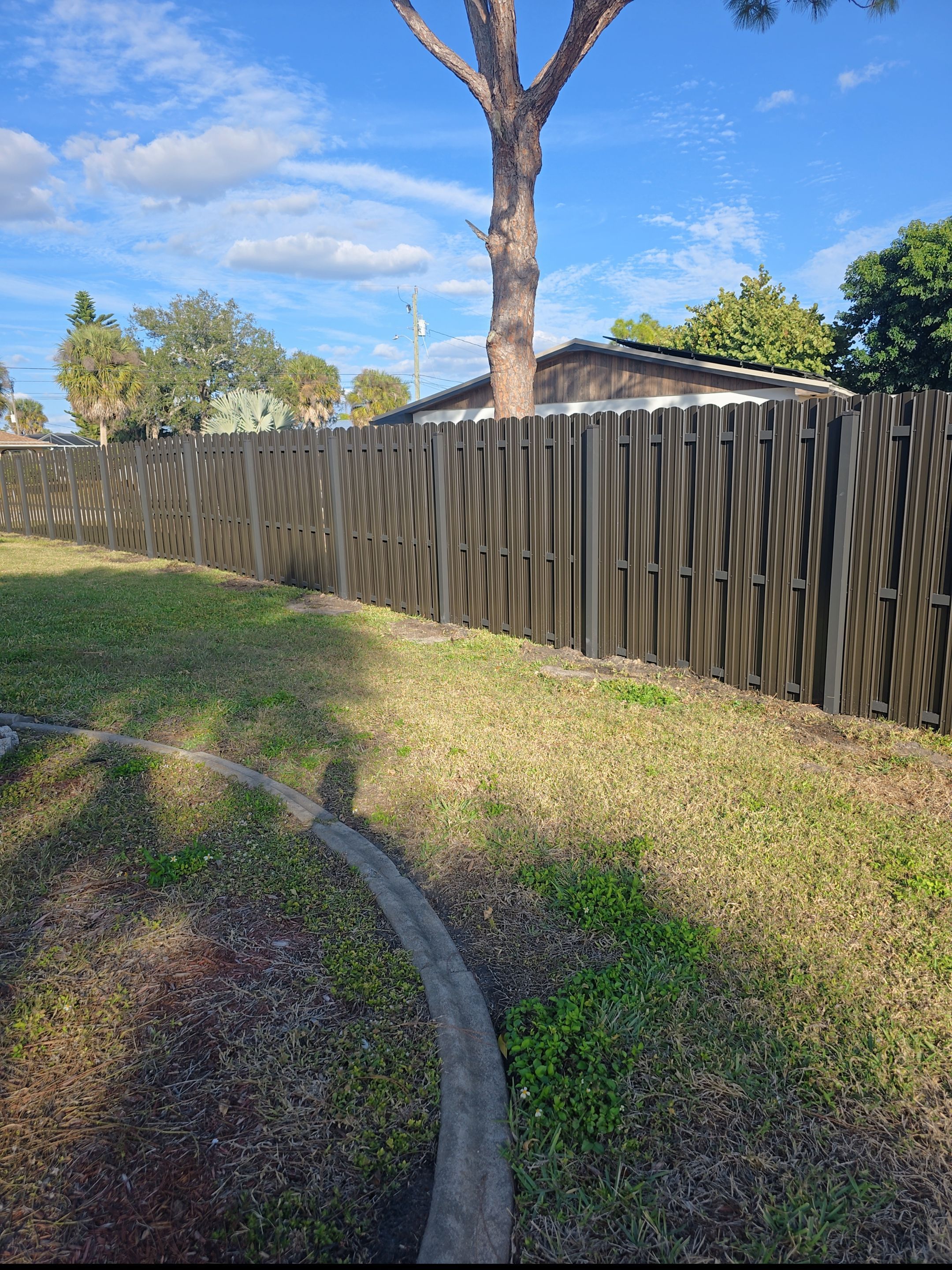 Bronze Metal Privacy Fence in Port Charlotte by True Fence LLC