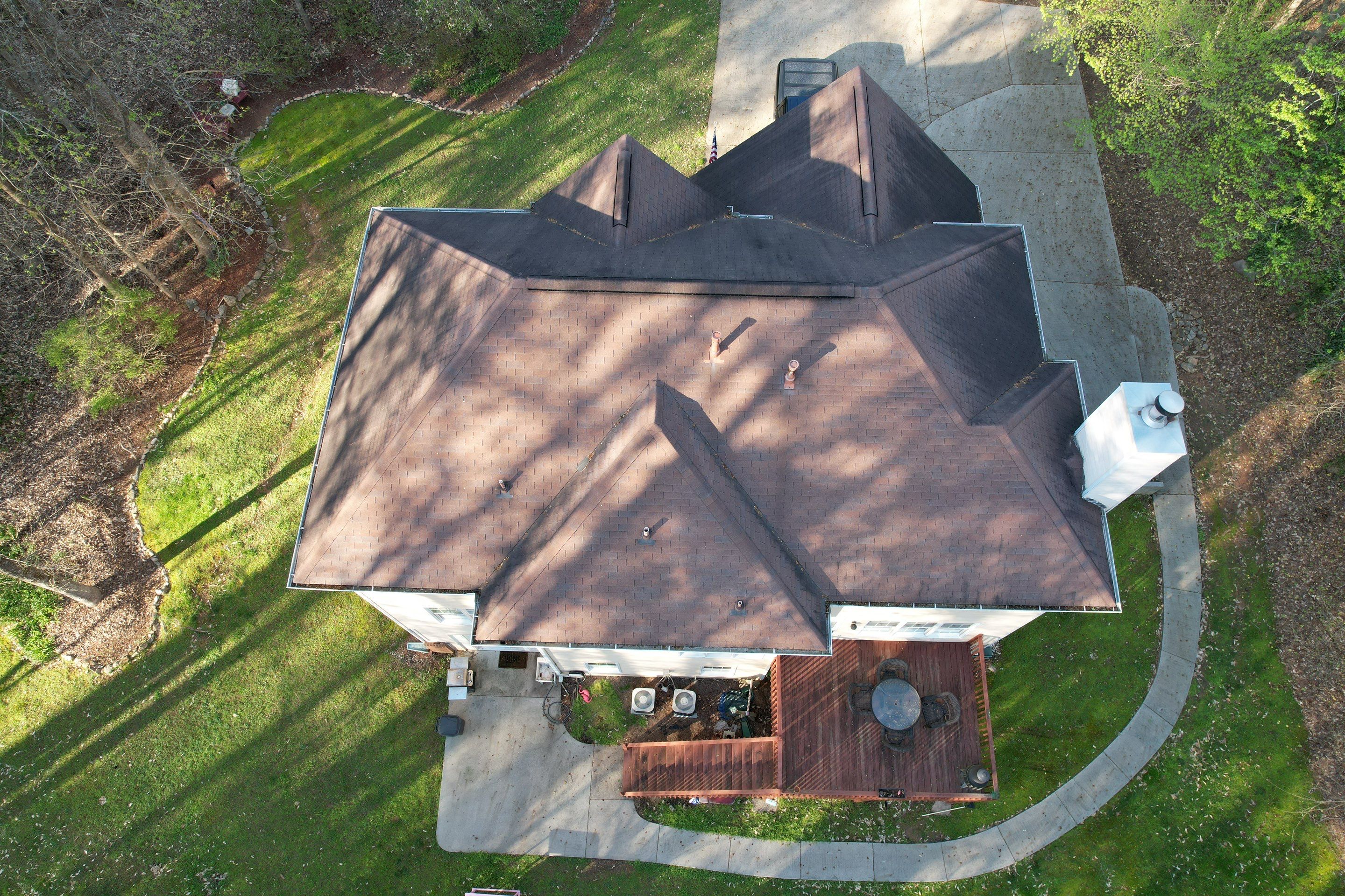 Residential Roofing Installation using Owens Corning Chateau Green  by Inspector Roofing and Restoration