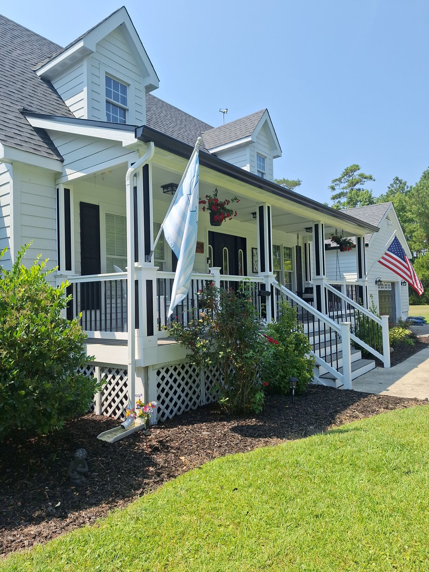 Black Gutter Installation by Gallop Roofing & Remodeling, Inc.