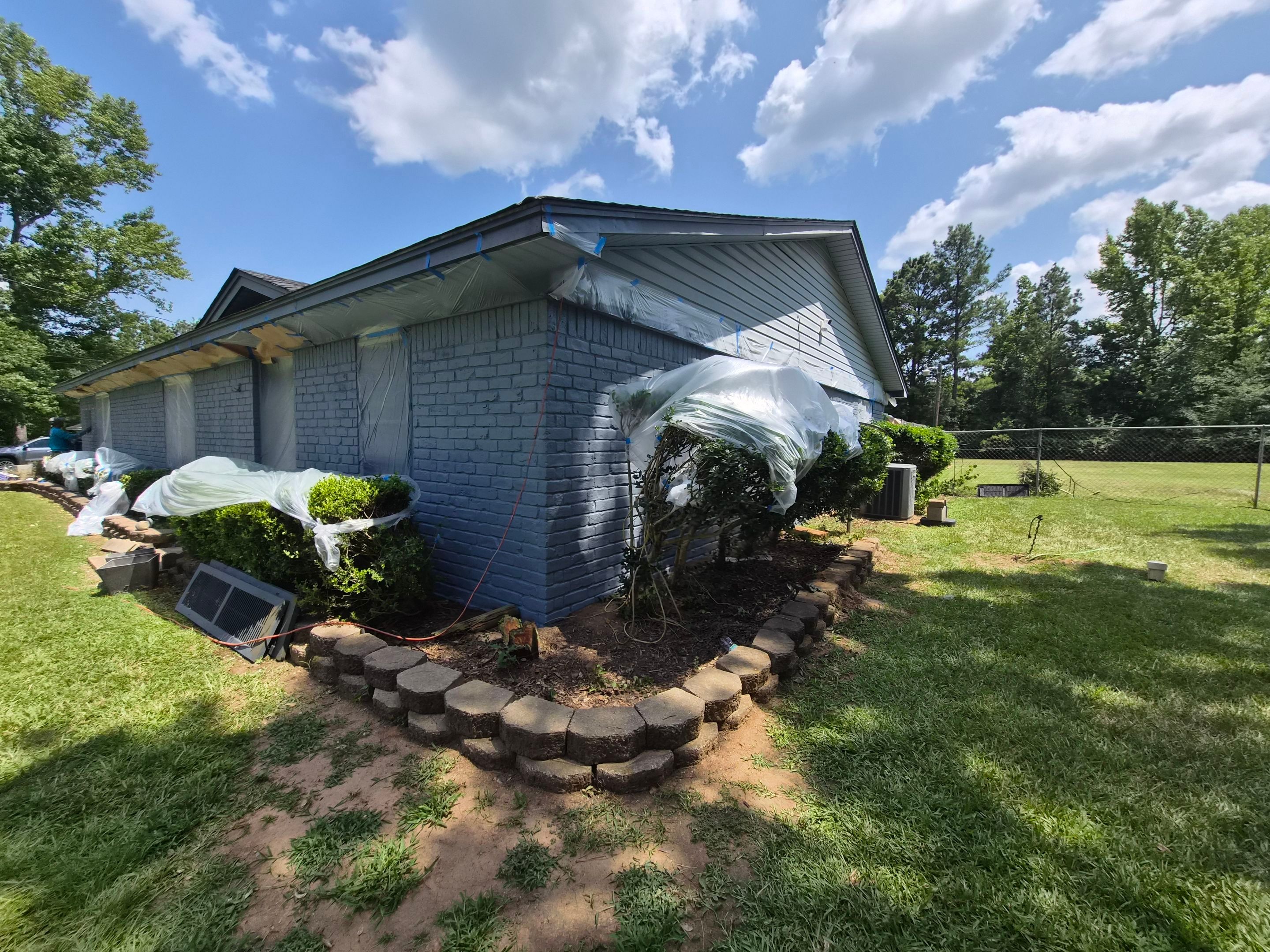Exterior Refresh Brick Painting Job in Overton, TX by Quality Coats Painting