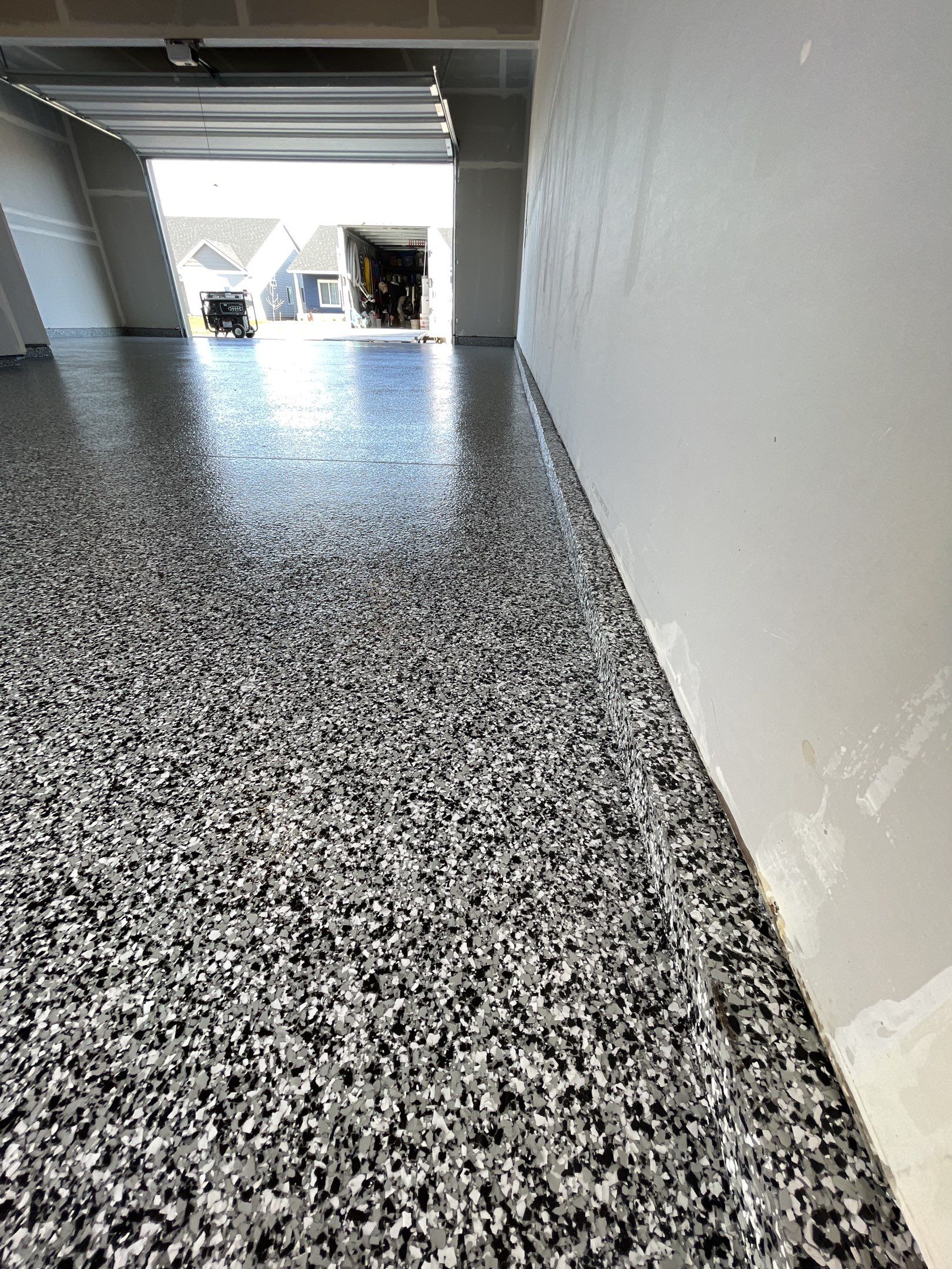 Garage Transformation using Domino by Croc Coatings, LLC