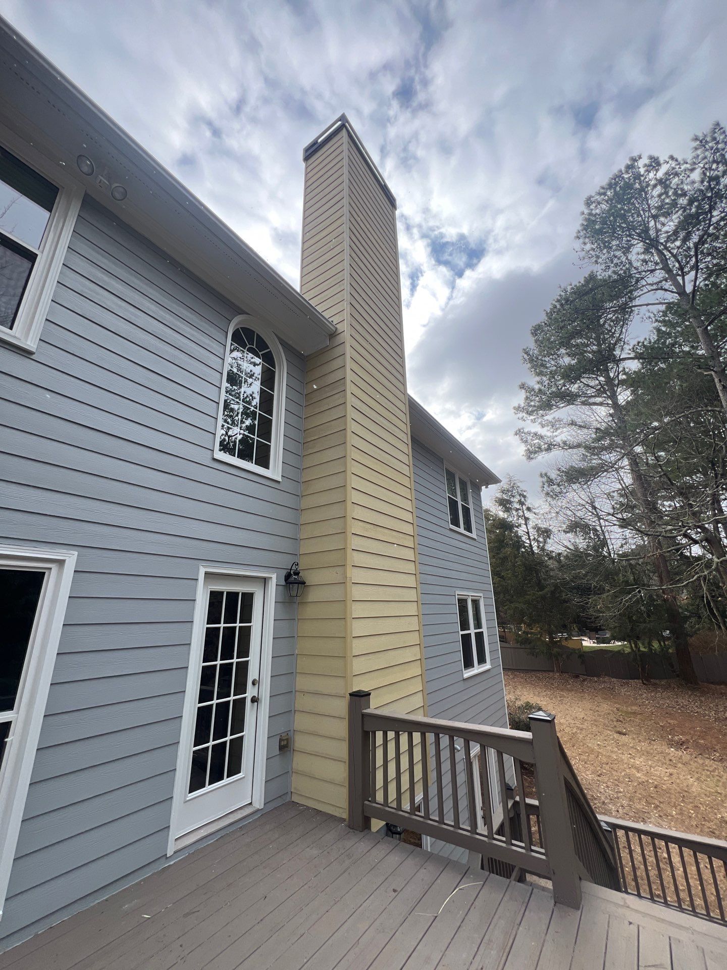 Chimney Siding Reconstruction and Full Exterior Painting in Marietta by Swift Home Renovations