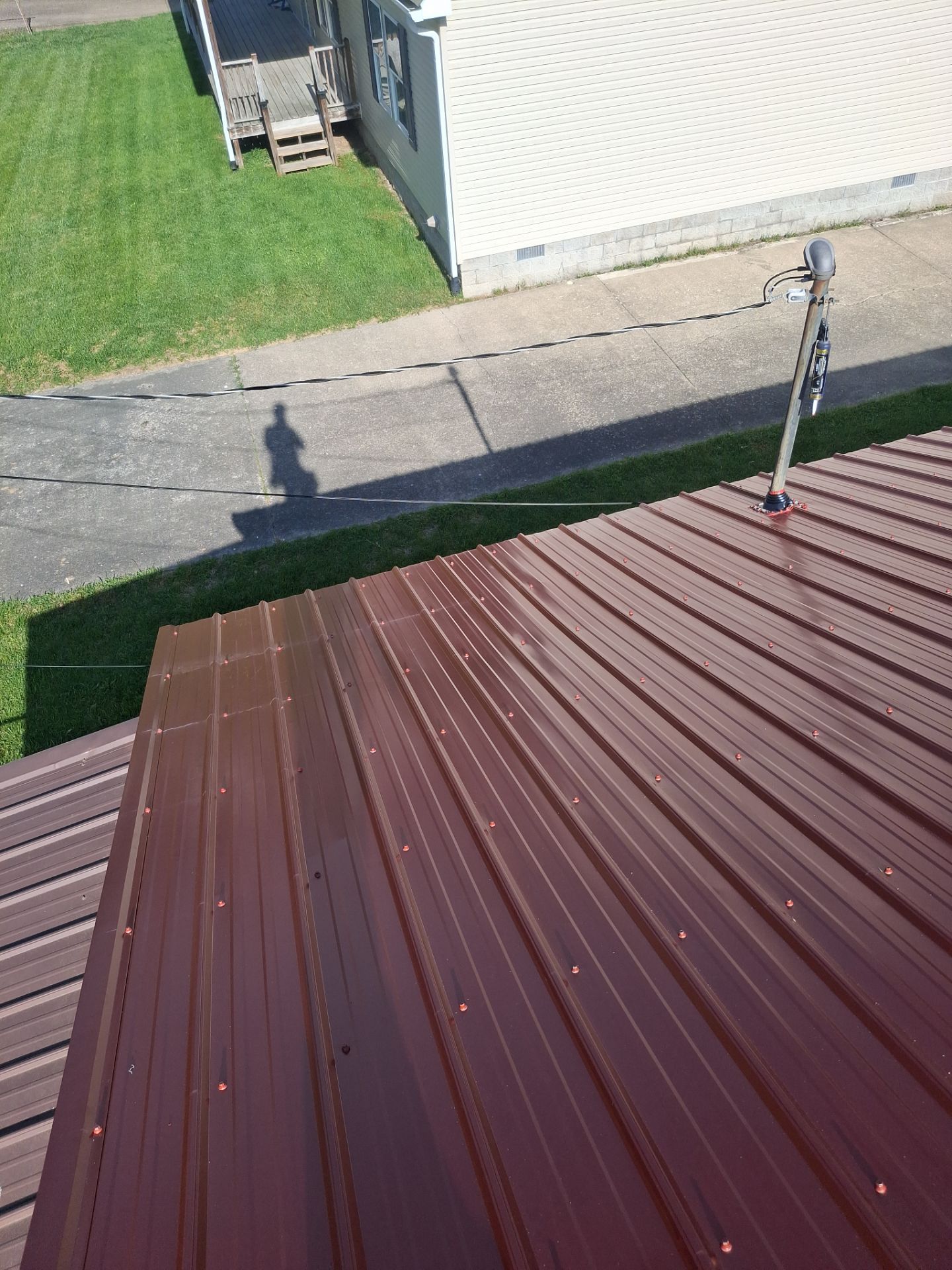 Residential Roofing Installation using Metal by Rainstoppers Roofing