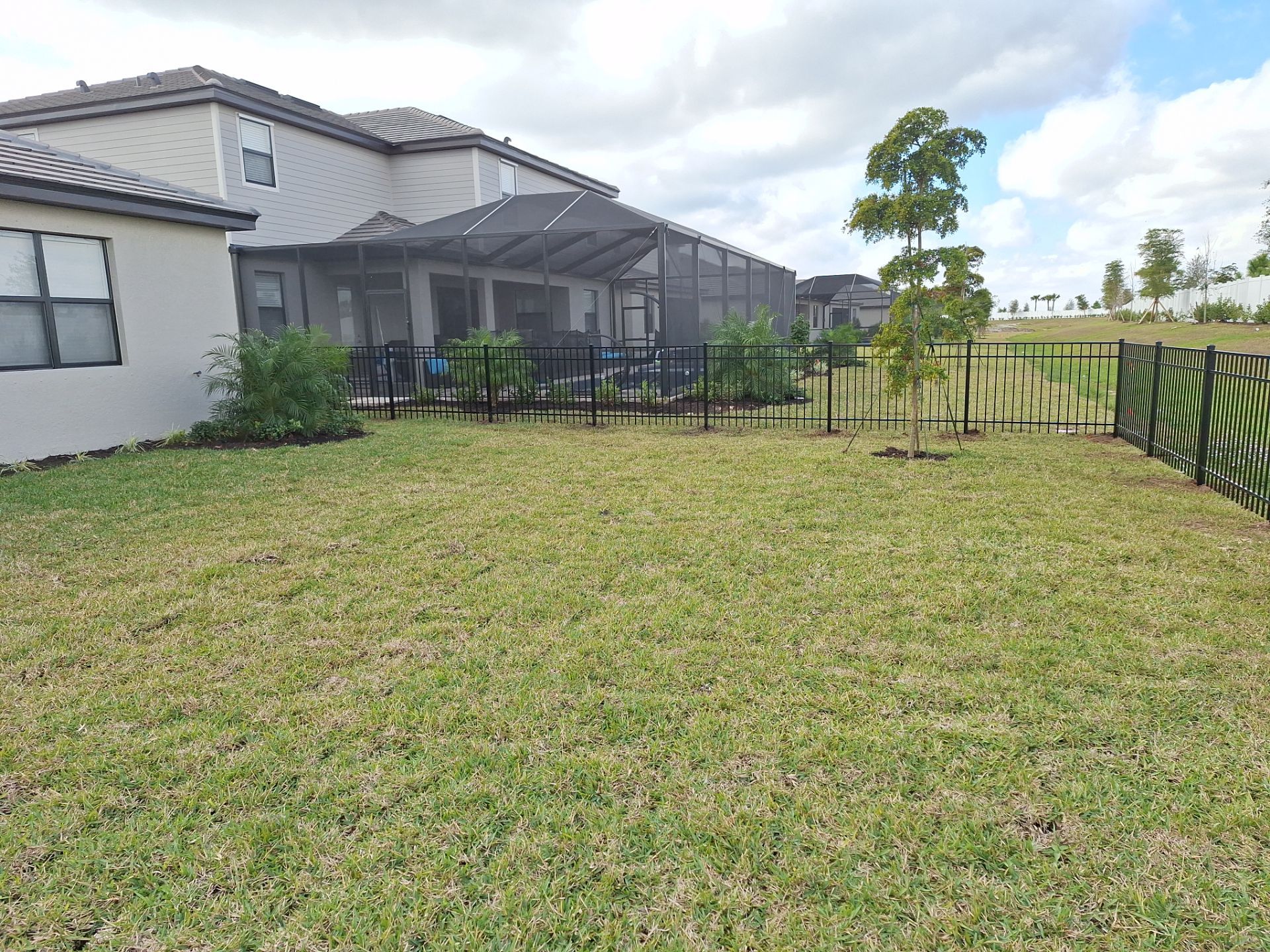 Aluminum Fence Installation using 4ft 3 Rail Black Aluminum Fence by Asap fence and gates, LLC