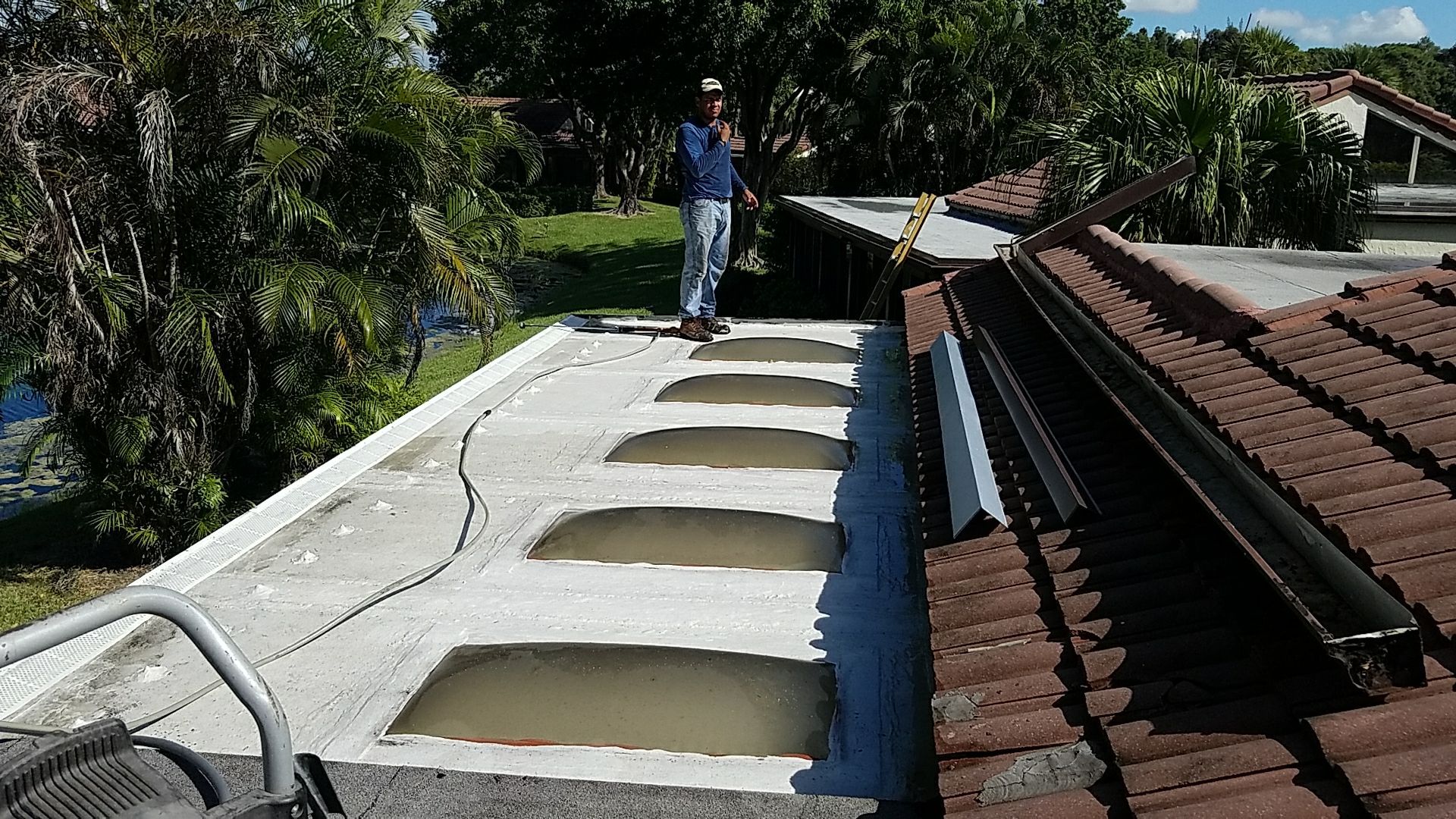 Skylight Repair and Flat Roof Sealant Application in Boca Raton by Aastro Roofing