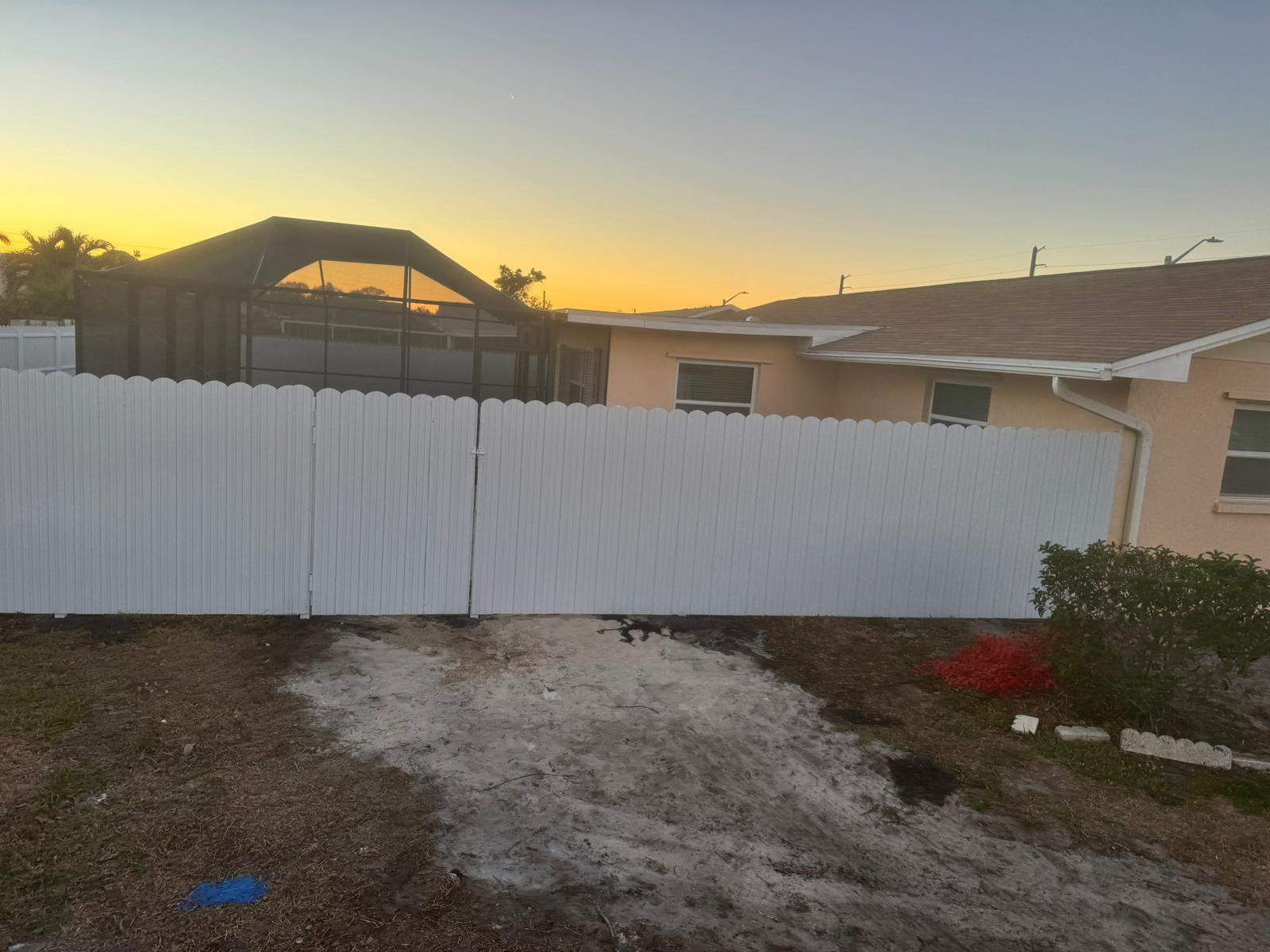 White Vinyl Privacy Fence Installation in Bradenton, Florida by True Fence LLC