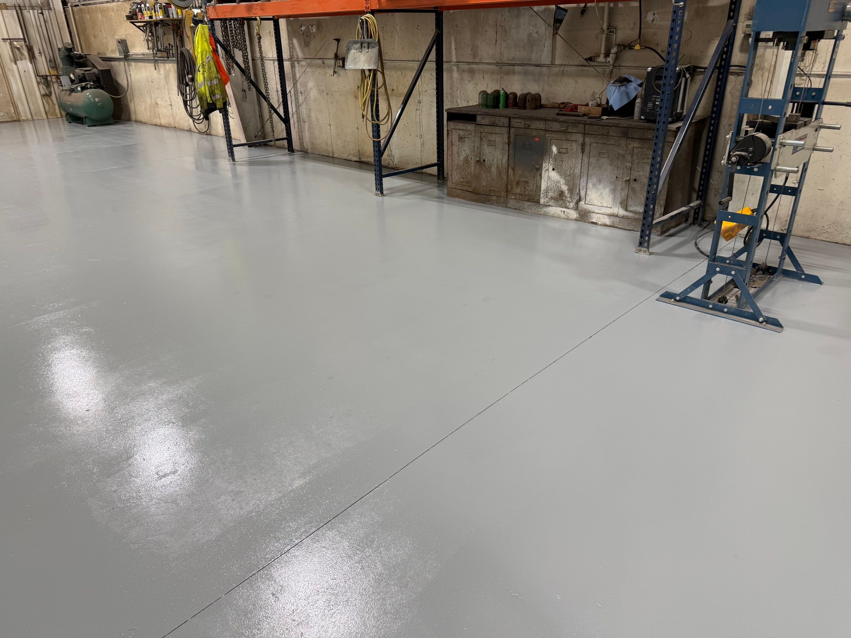 Commercial Concrete Coating and Floor Refinishing in Sioux Falls by Select Painting, Coatings & Garage Cabinets