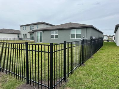 Aluminum Fence Installation using Black 3 Rail Aluminum Fence
