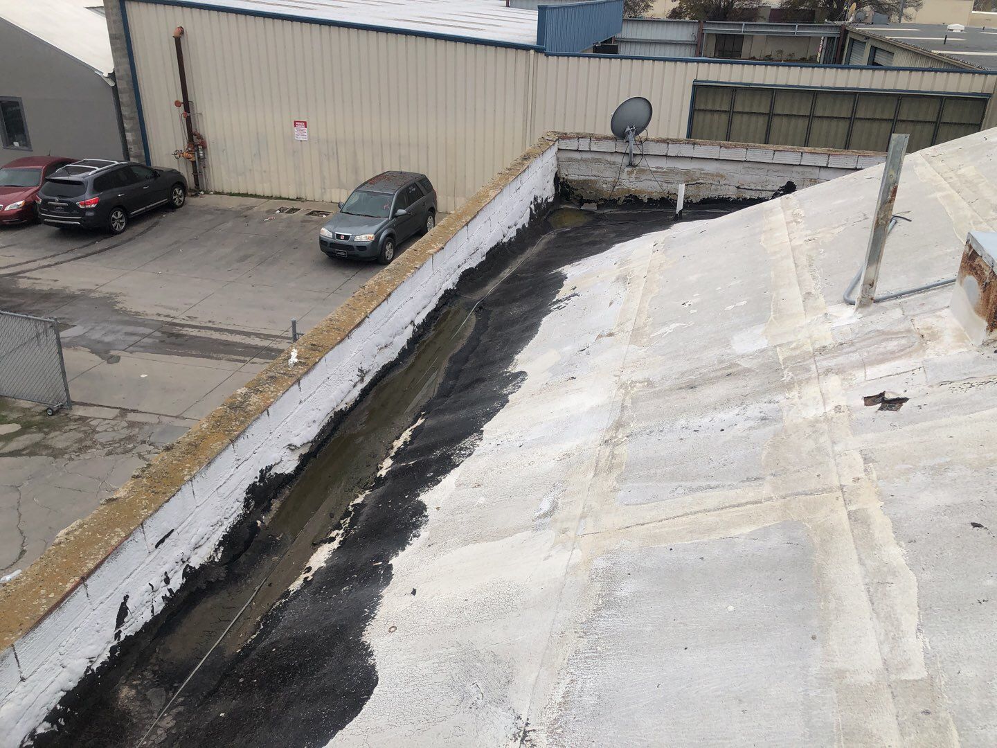 Spray foam and coatings using Conklin Benchmark/PUMA XL coatings and spray foam by Straight Edge Roofing Inc