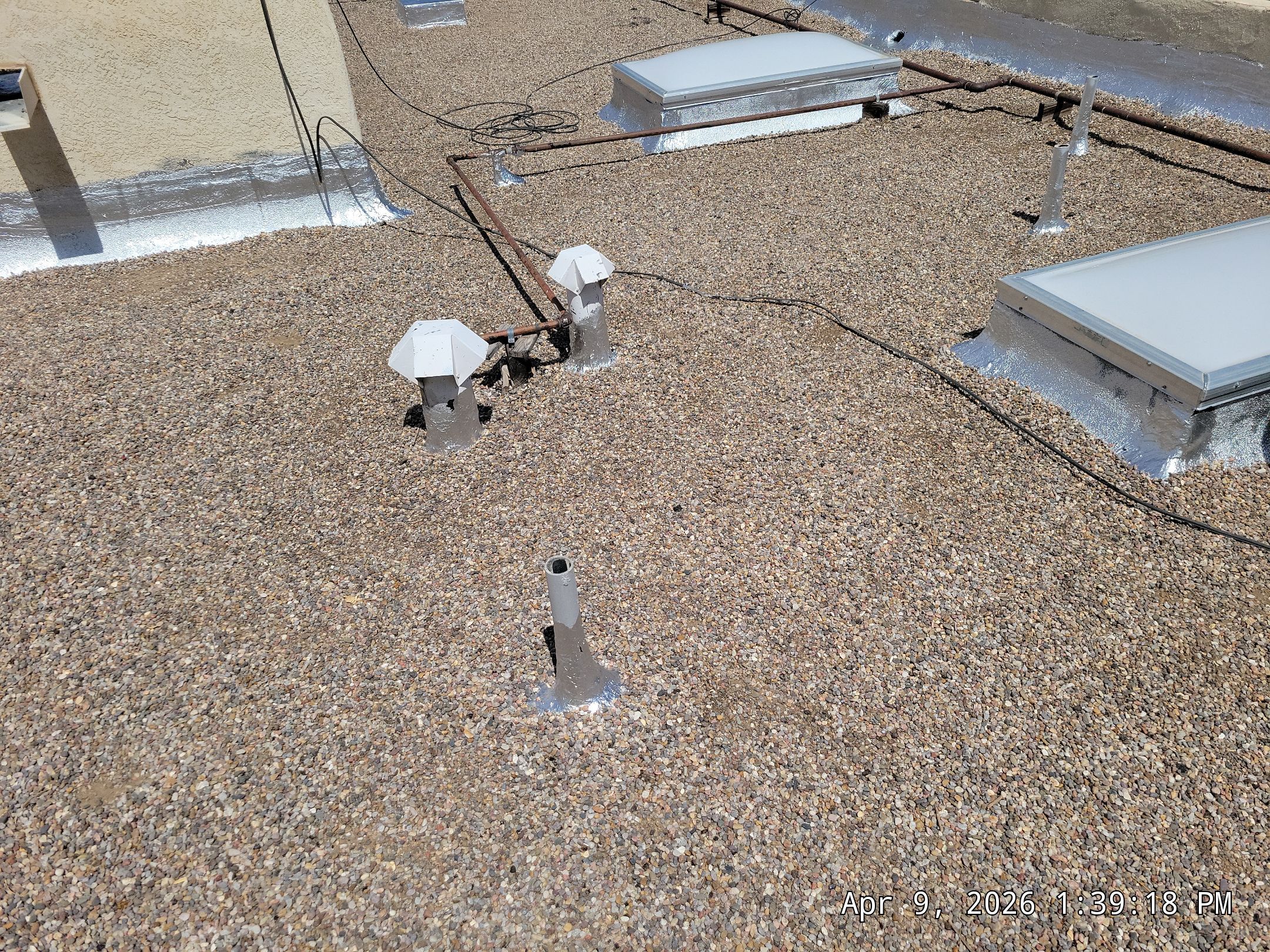 Tar and Gravel Roof Maintenance and Skylight Sealing in Rio Rancho by Doyle Roof Masters Inc