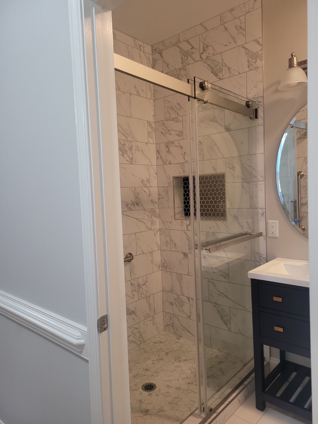 A Pathway to Possibility – Turning a Half Bath into a Full Retreat in Holly Springs by Elite Remodeling and Design LLC