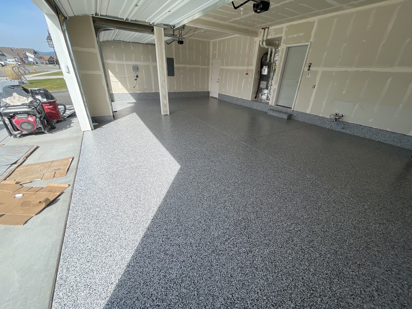 Garage Transformation using Domino by Croc Coatings, LLC