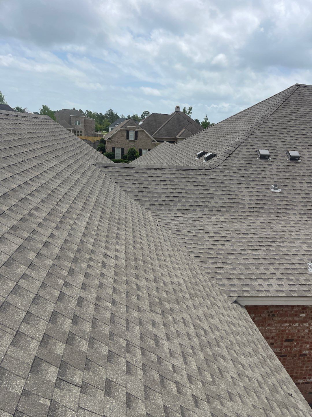 Residential Roofing Installation using Roof Replacement by American Roofing & Construction LLC