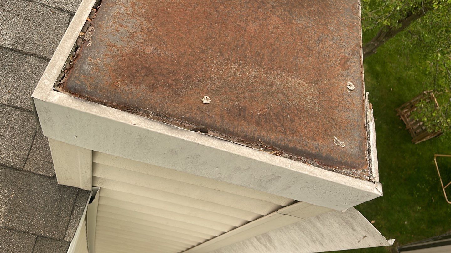 Gutter Cleaning Chimney top repair by A Plus Exterior