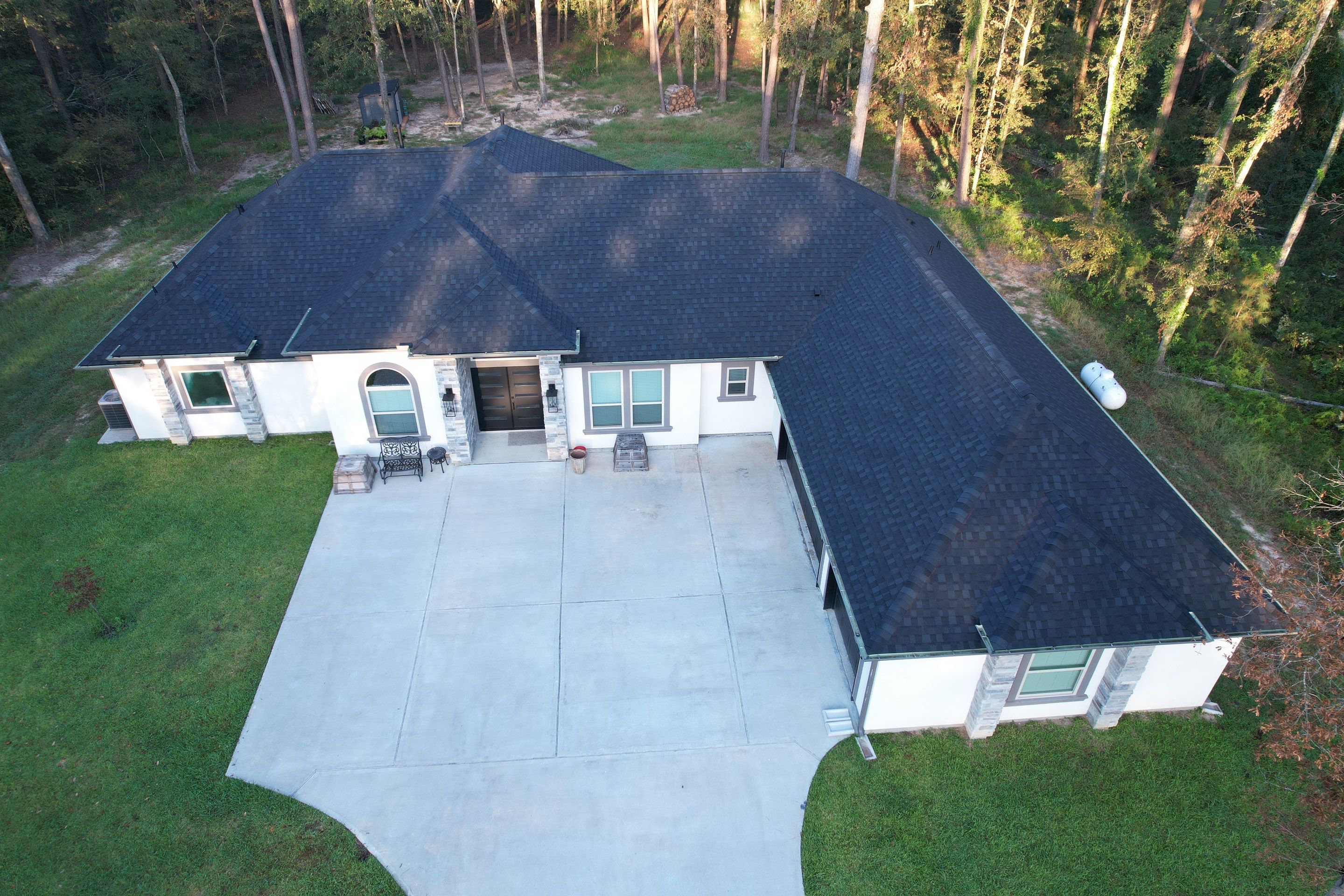 TAMKO Titan XT Rustic Black by STX Roofing