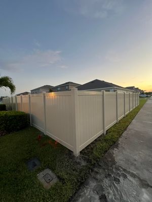 Vinyl Fence Installation using Tan Vinyl Privacy Fence