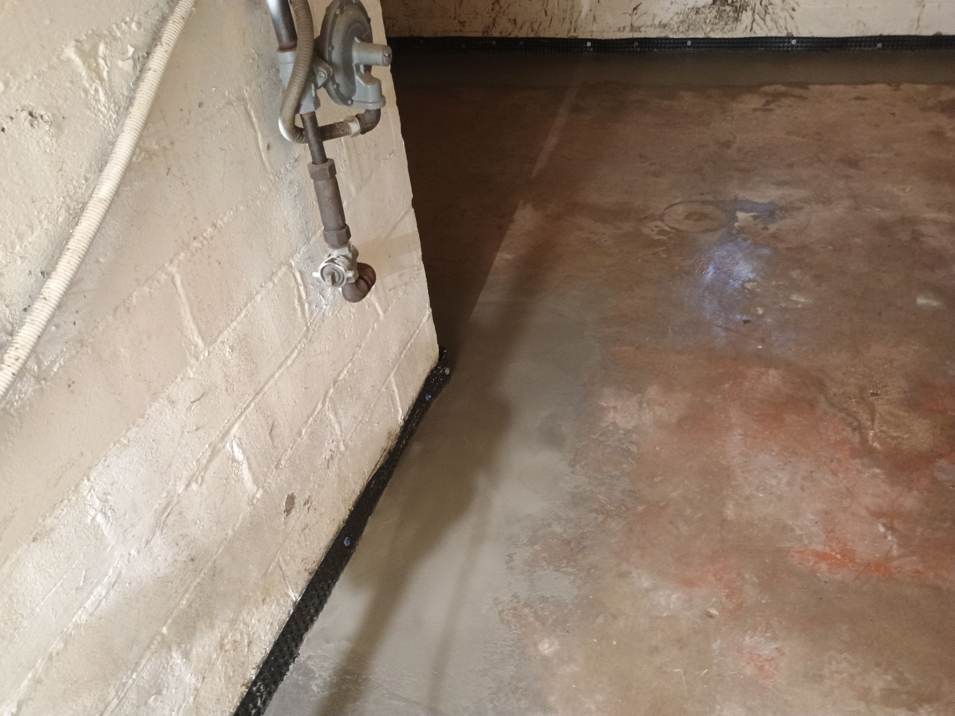 Interior Drain Tile & Sump Pump System in North Minneapolis by Waterproofing Northeast