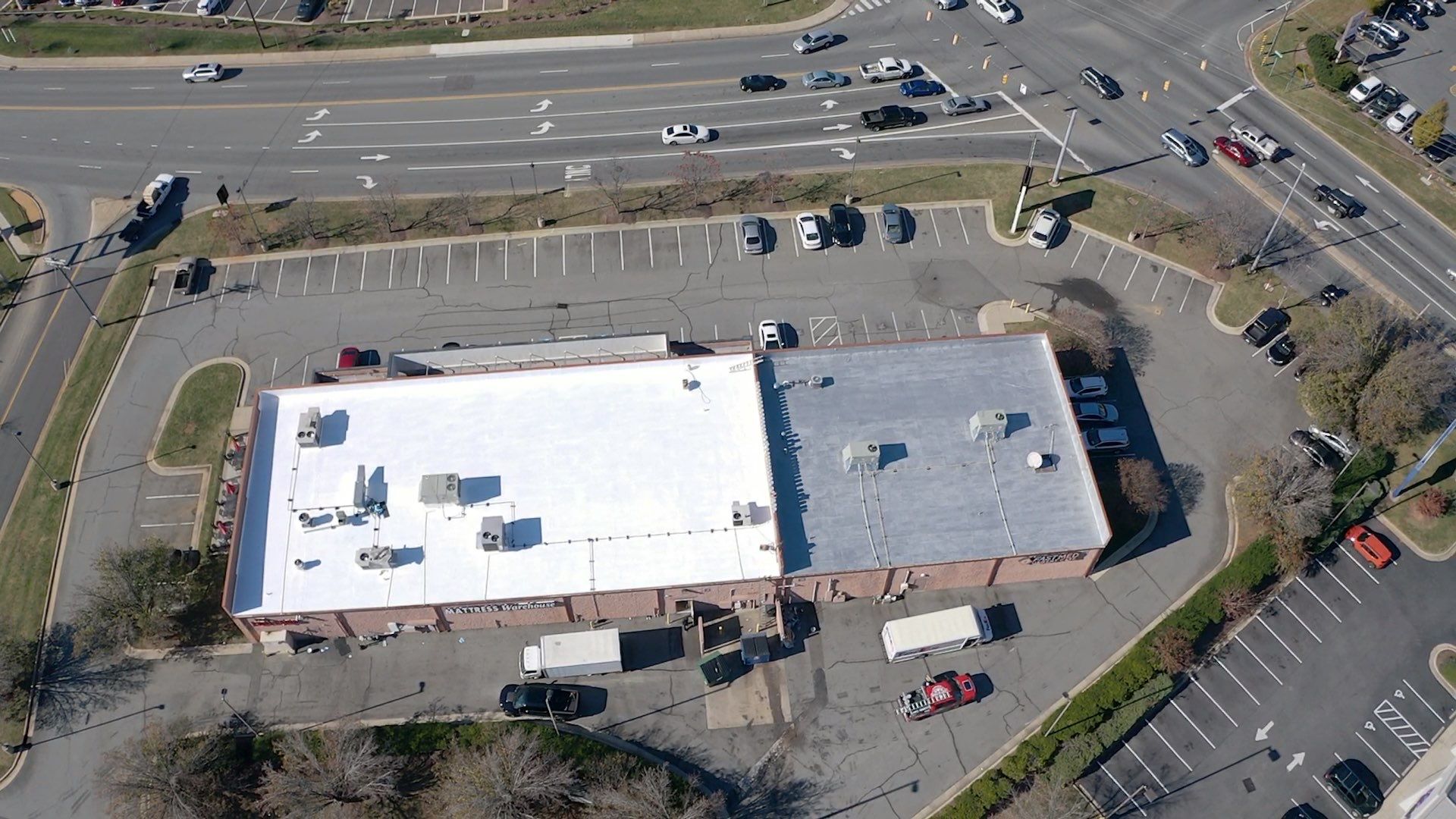 Commercial Coating using Poly Urerthane and Silicone Coating by Just In Time Roofing and Restoration