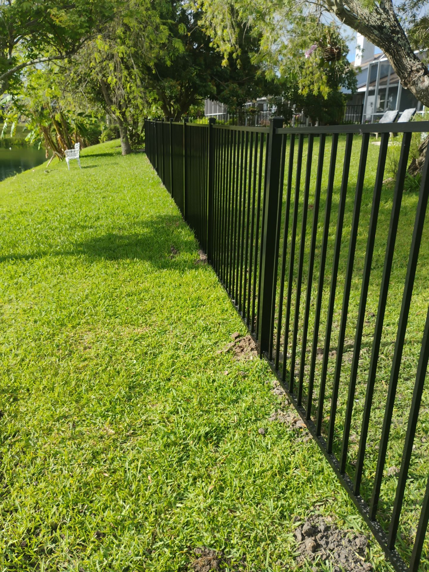 Black Aluminum Picket Fence Installation for Nokomis Waterfront Property by True Fence LLC