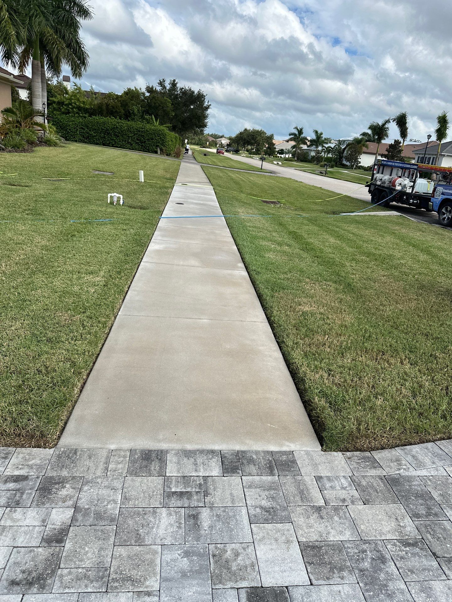 Complete Two-Story House Wash and Driveway Cleaning in Winding River Community, Bradenton, FL by Sunshine AquaWash