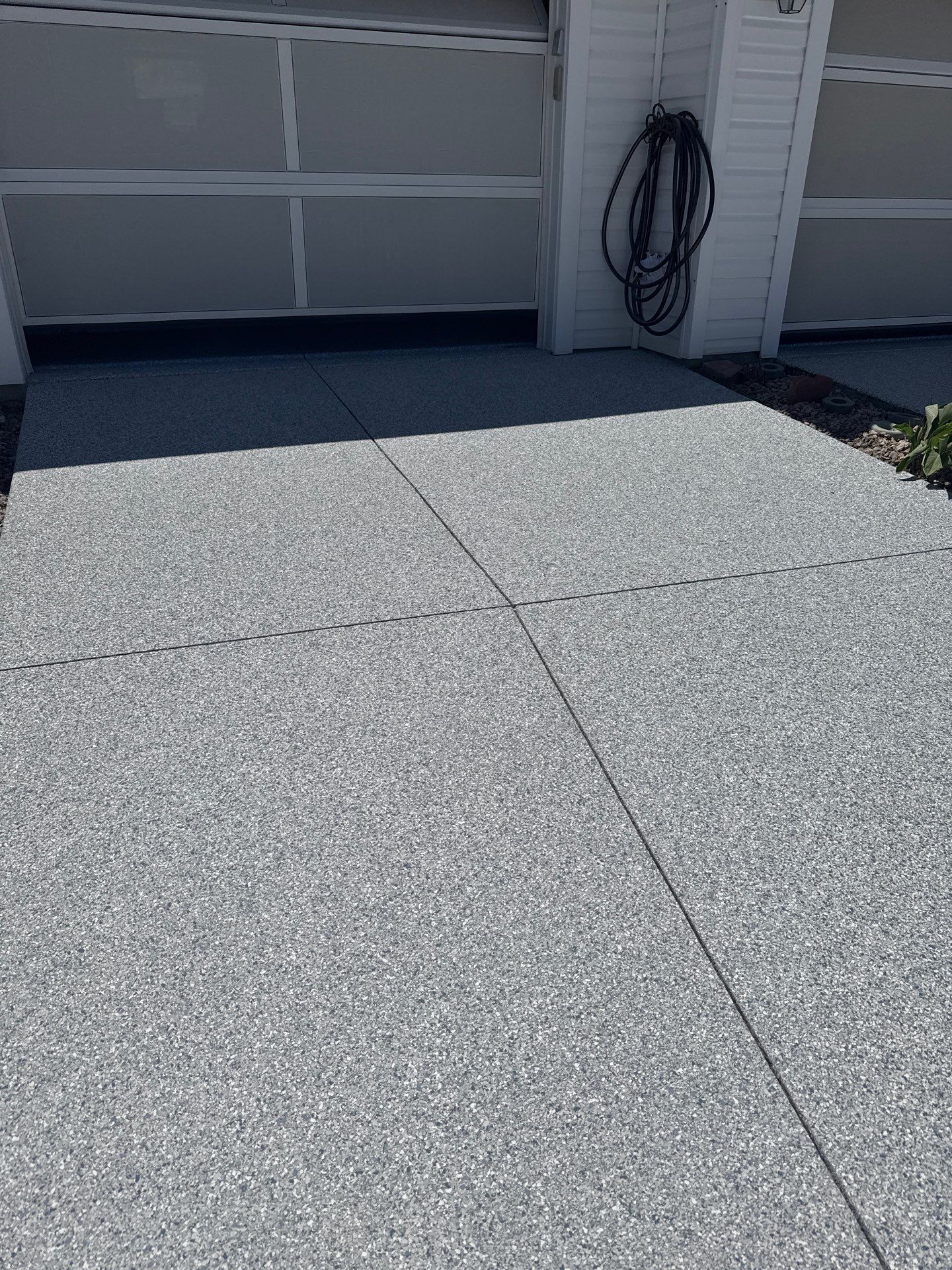 Garage, Drivewat, and Sidewalk in Landshark and Tidalwave by Innovative Concrete Coatings 