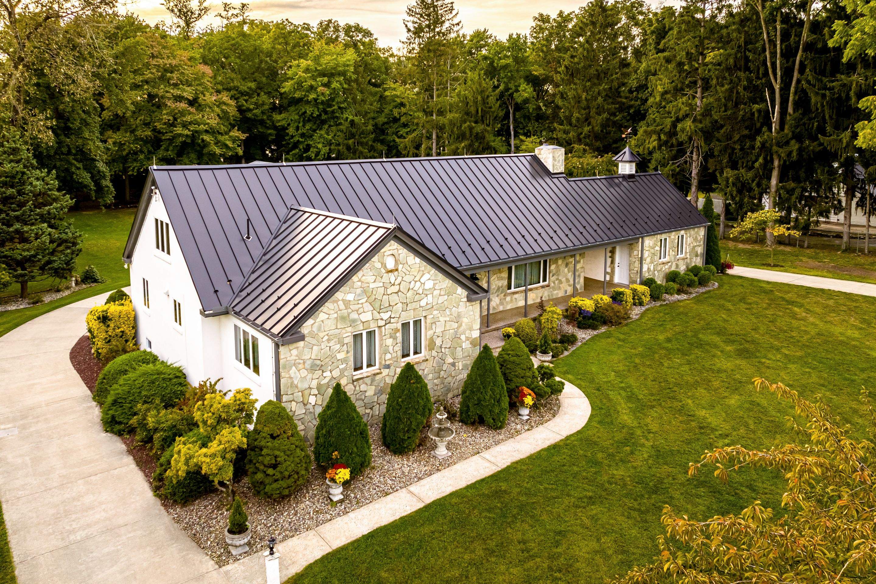Standing Seam Metal roof-black by Esh Builders