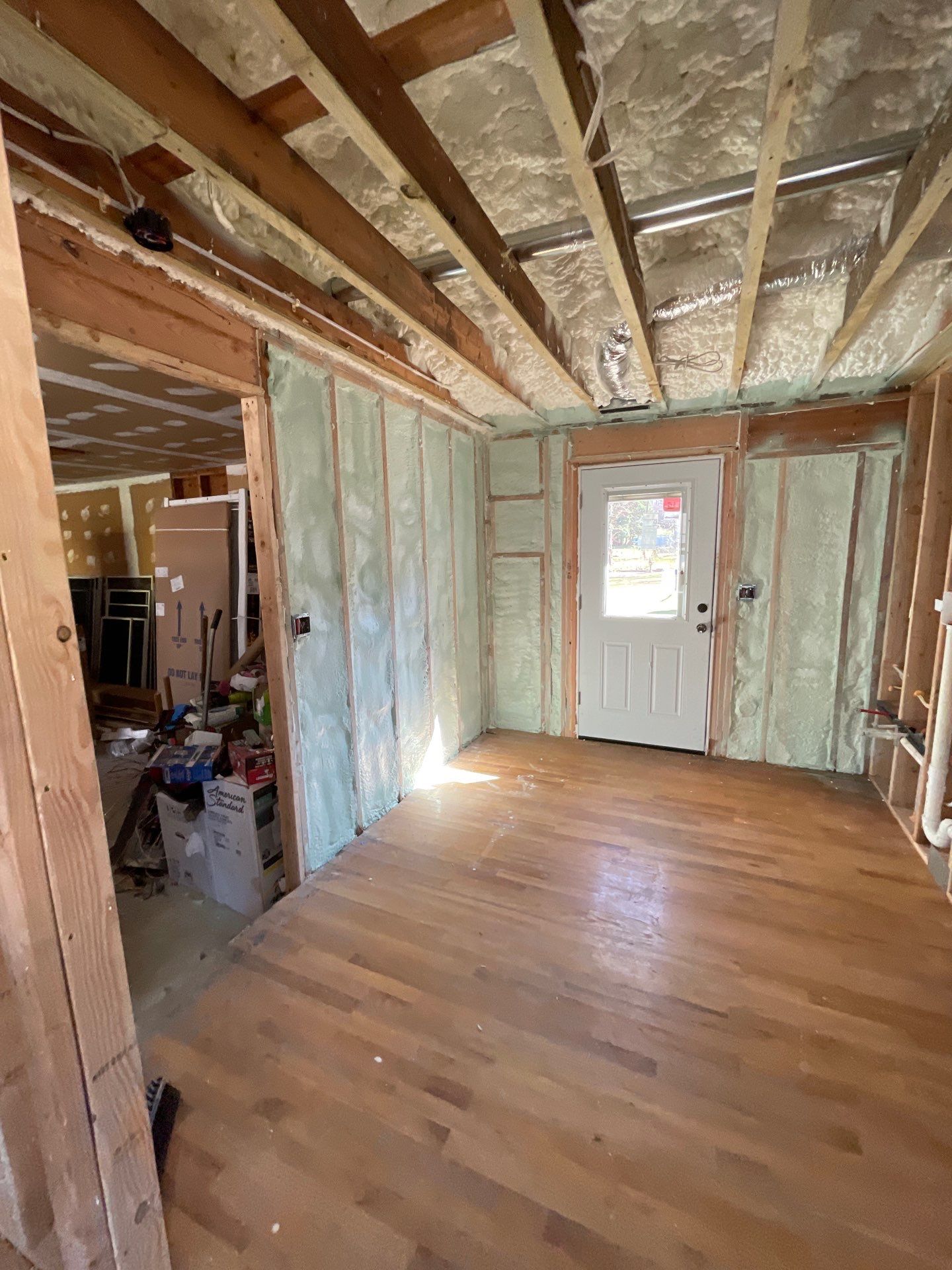 Basement Exterior Walls using Closed Cell Spray Foam by NYS Foam & Energy