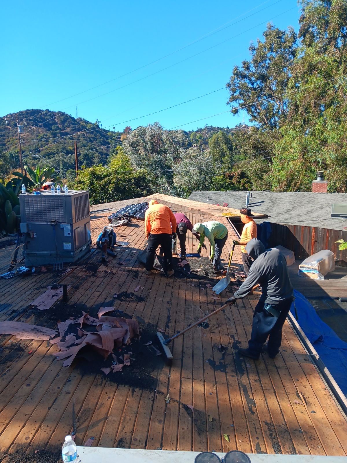 Residential Roofing Installation using Polyfresko® G Highly Reflective Modified Bitumen Cap Sheet by Hull Brothers Roofing