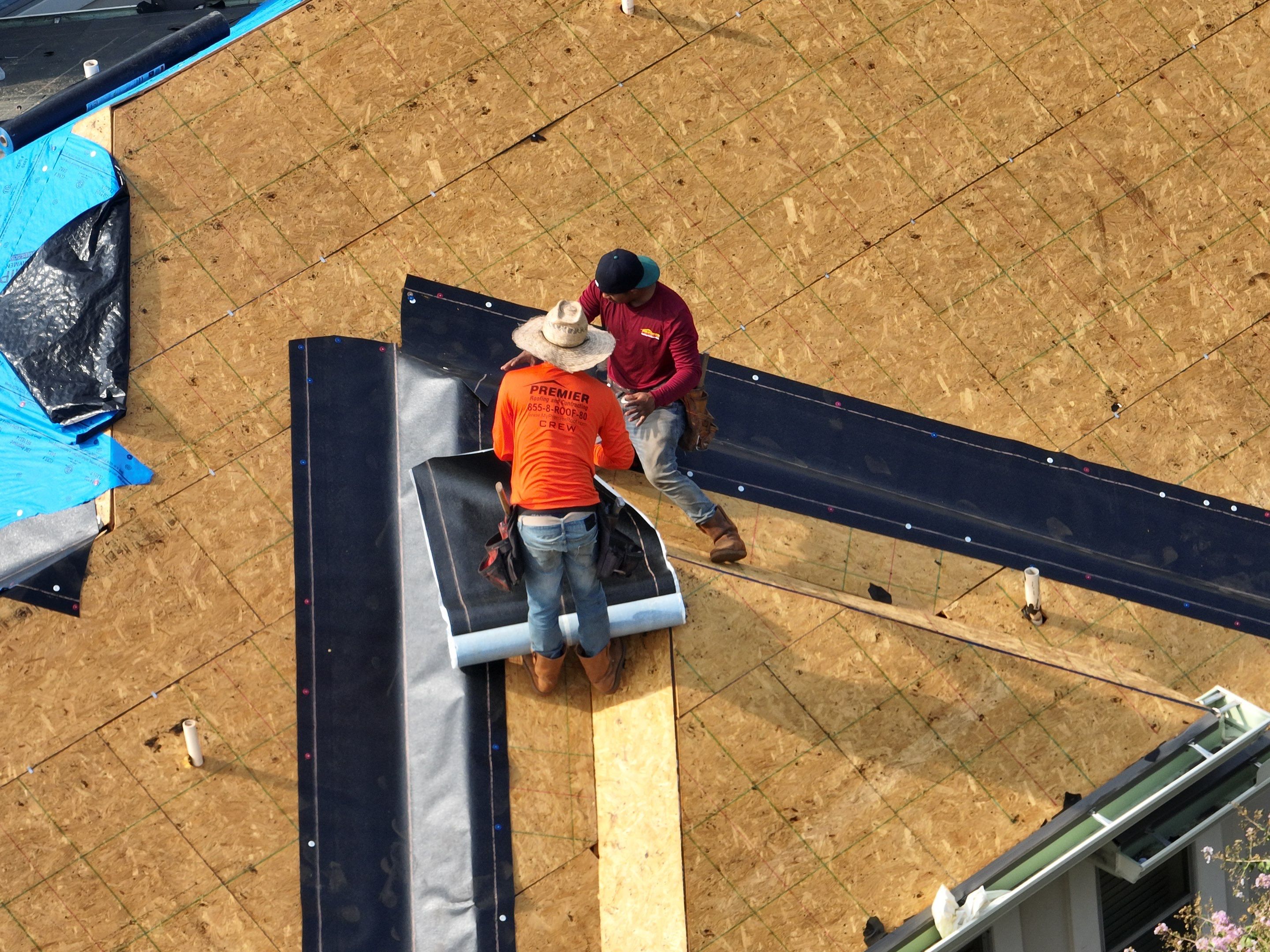Residential Roof Replacement using 30 Year Laminate Shingles with High Profile Ridge by Premier Roofing and Contracting