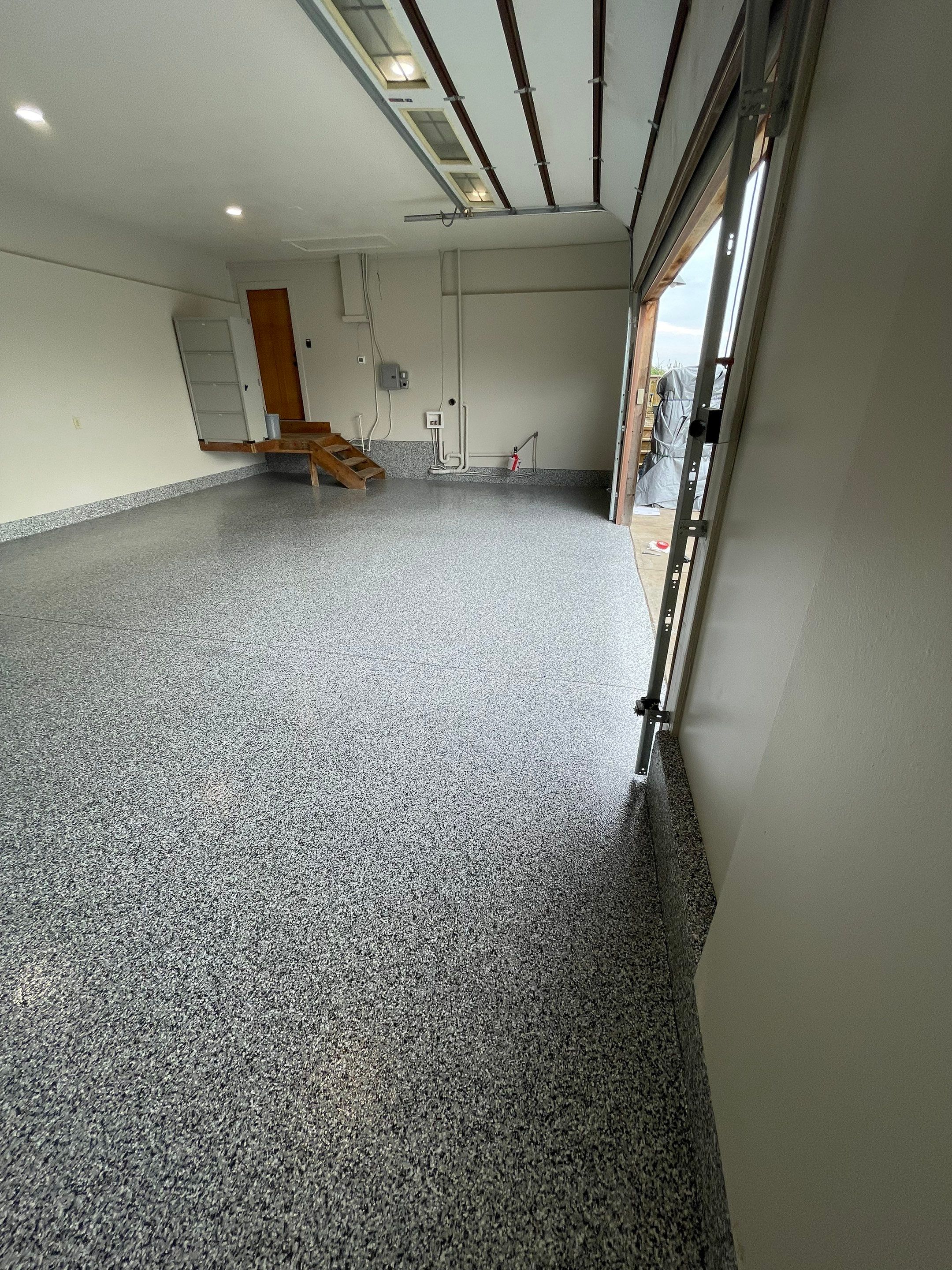 Domino Flake Floor Coating and Crack Repair in Chancellor by Select Painting, Coatings & Garage Cabinets