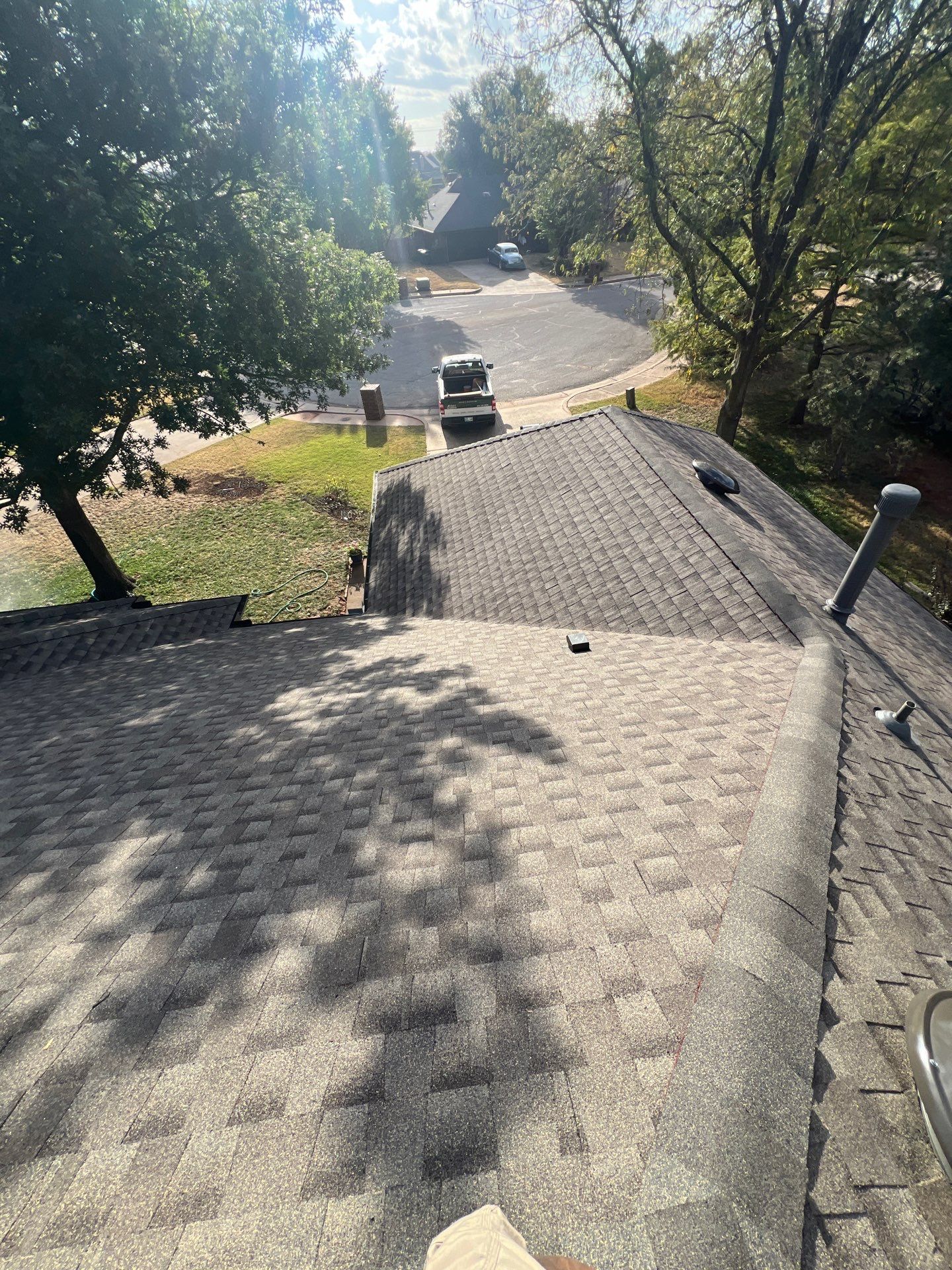 Roof Replacement and Sun Tunnel Installation in Edmond, OK by McCann's Roofing and Construction