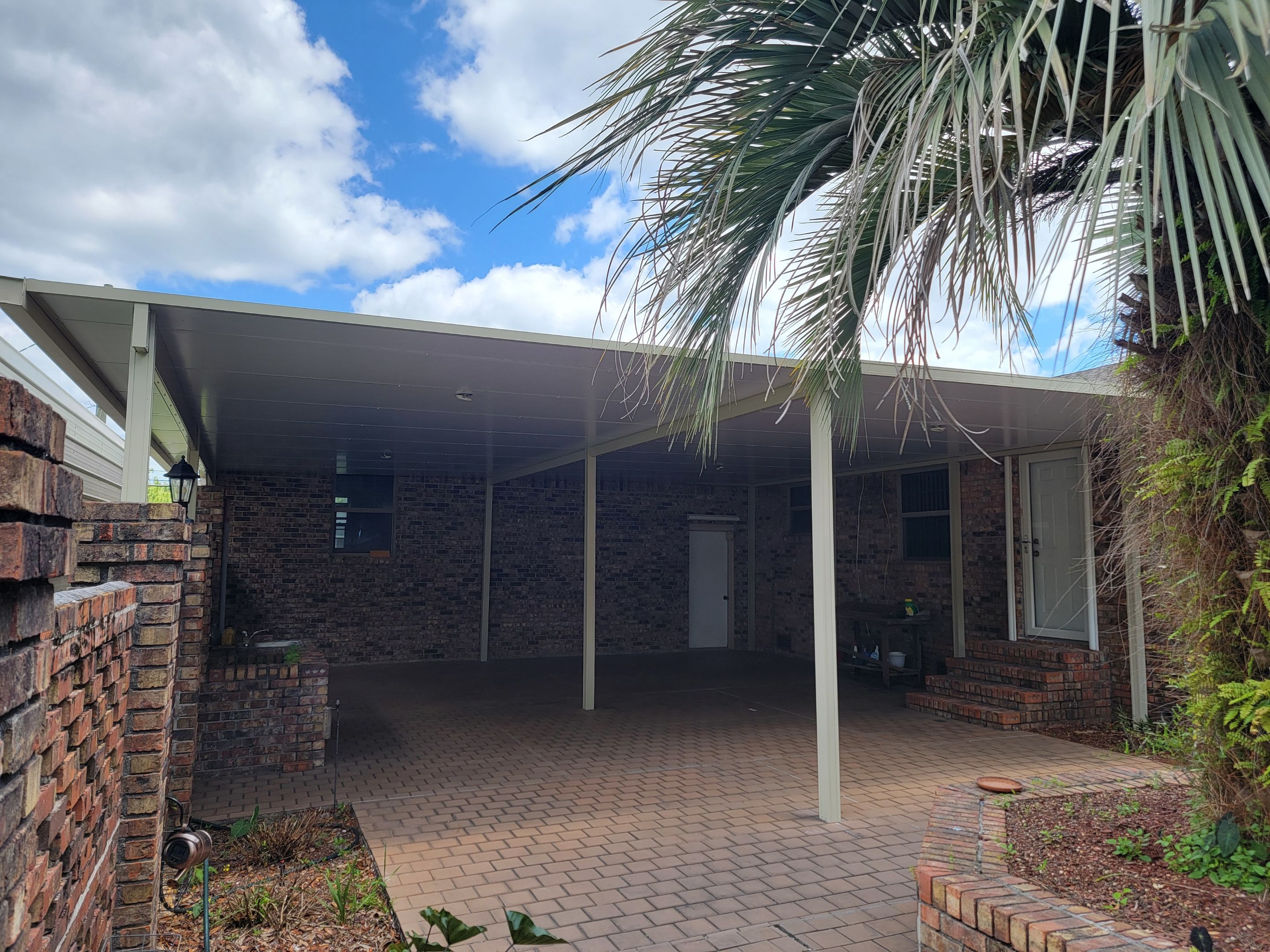 Patio Cover using Colorbeam by Titan Sunrooms