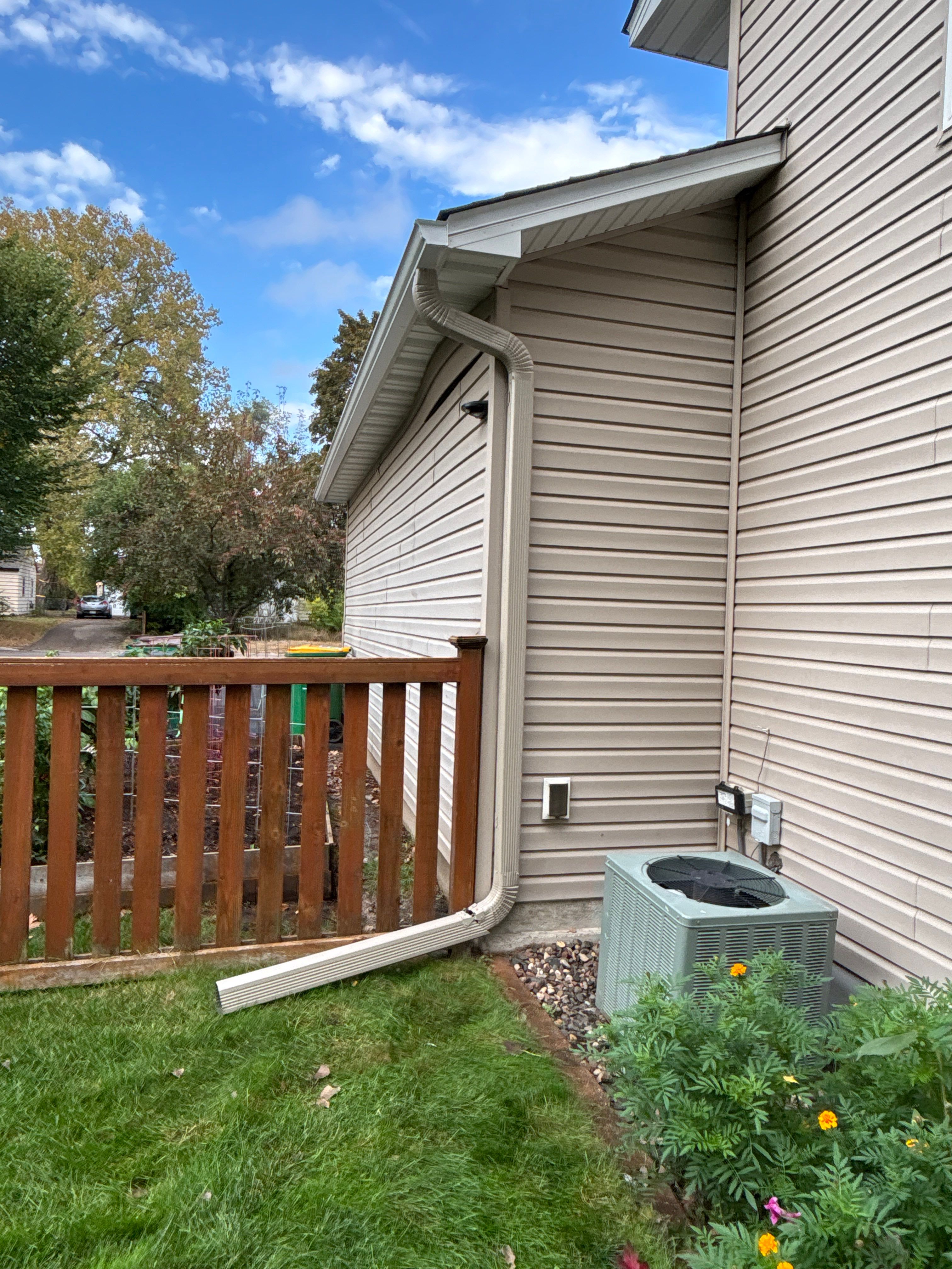 5" White Seamless Gutter Installation with Clay Downspouts – Crystal, MN by Next Level Seamless Gutters / Exteriors Inc.