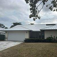 24ga 1.5" Mechanical Seam Regal White  by Total Roofing System The Metal Roof Experts