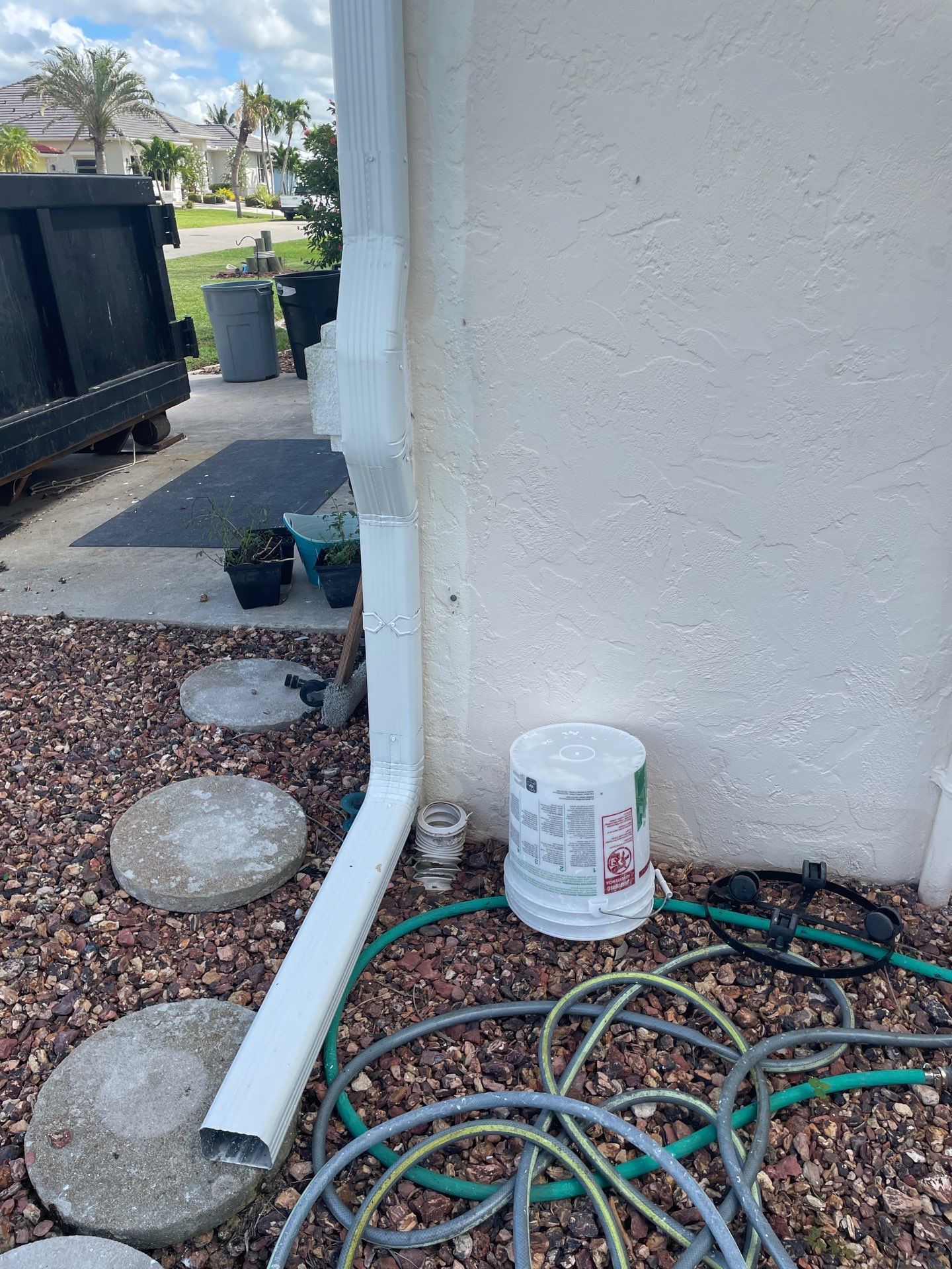 Connect Downspouts to Drain in Punta Gorda FL by Gutter Professors