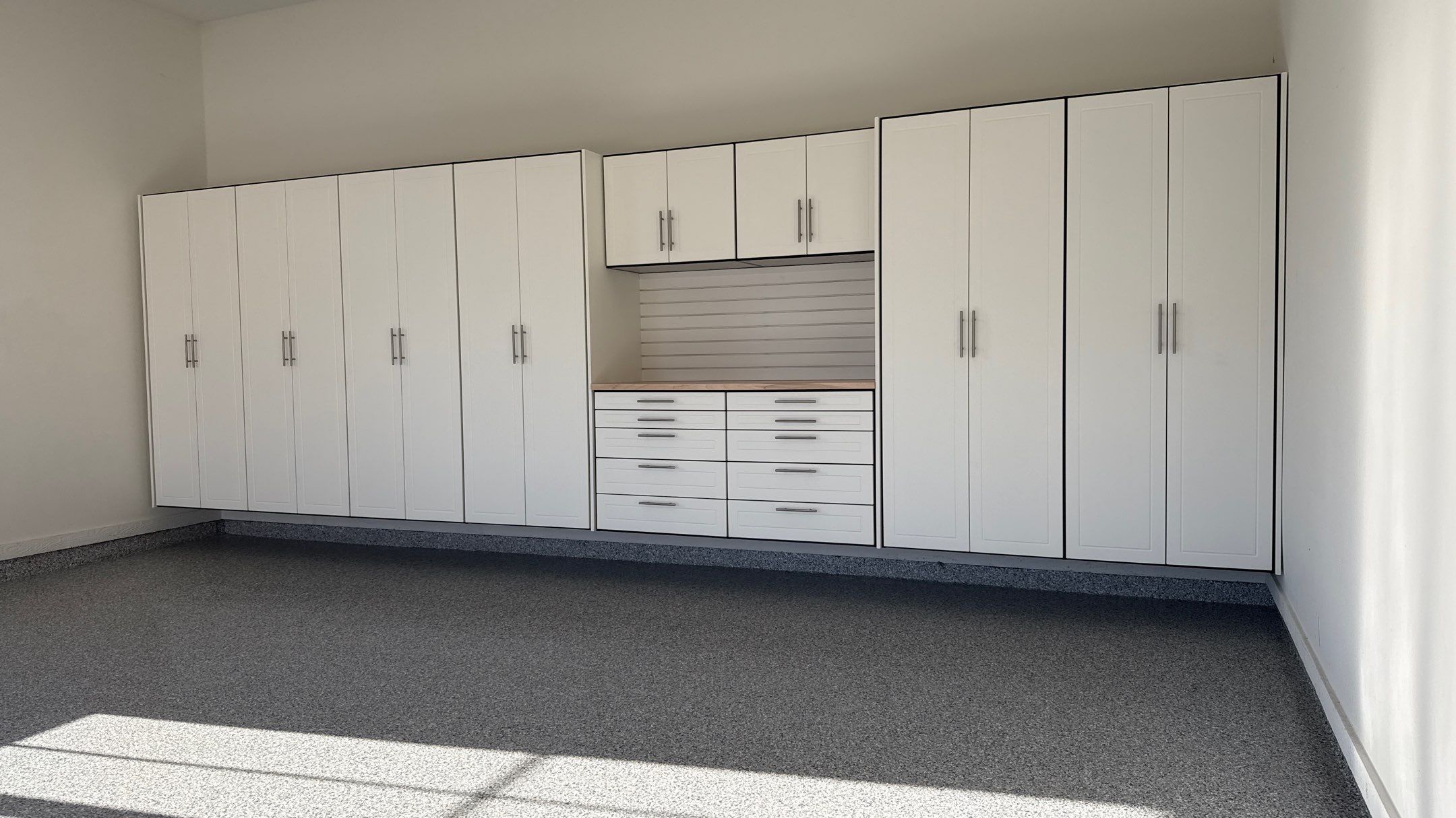 Garage Remodel with Custom Cabinets and Epoxy Floors in Overland Park by Banner Garage