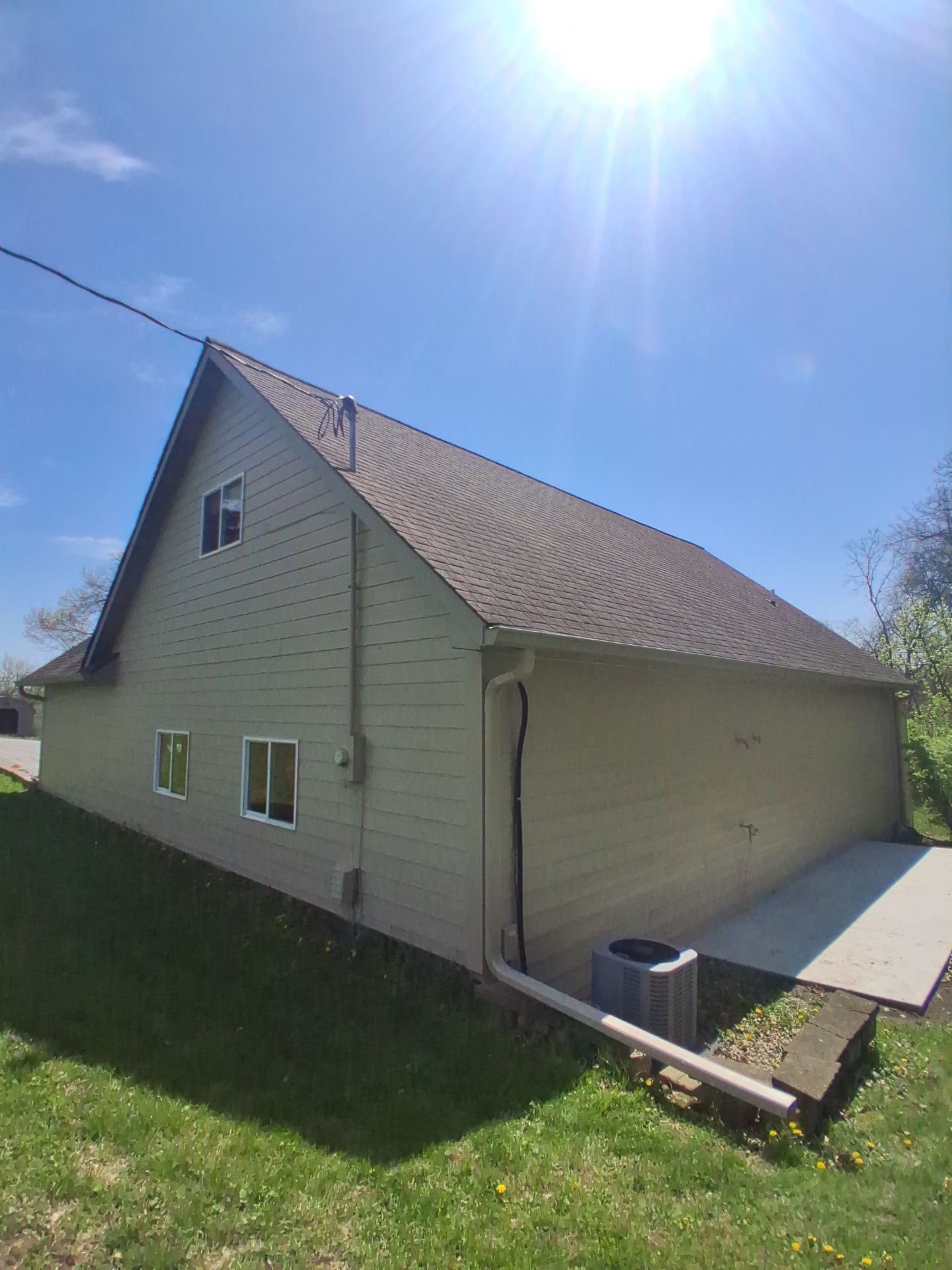 Residential Exterior Repaint Including Shop and Shed  by Midwest Paint LLC