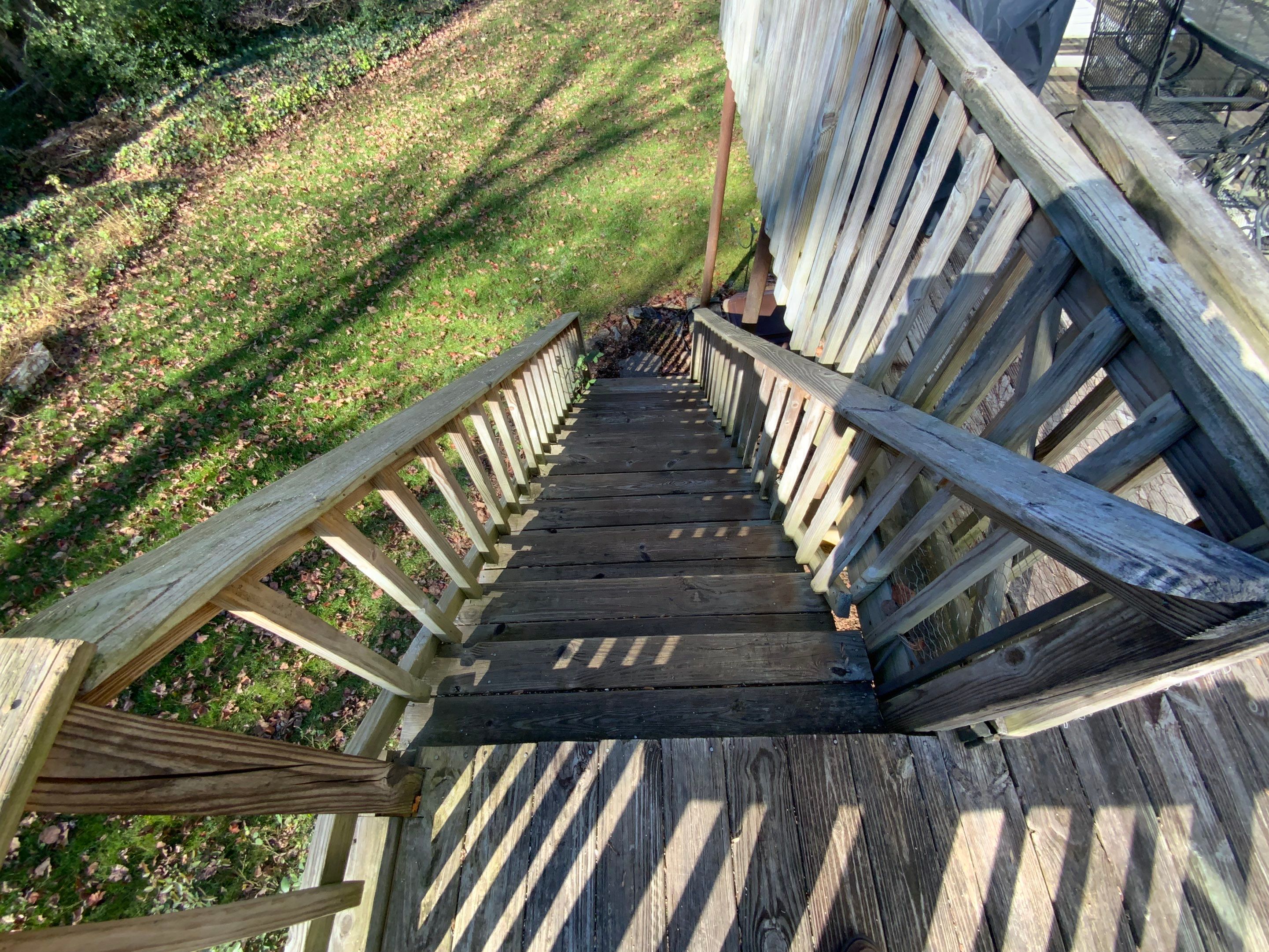 Elevated Grey Composite Deck Installation in Woodstock, Georgia by Swift Home Renovations