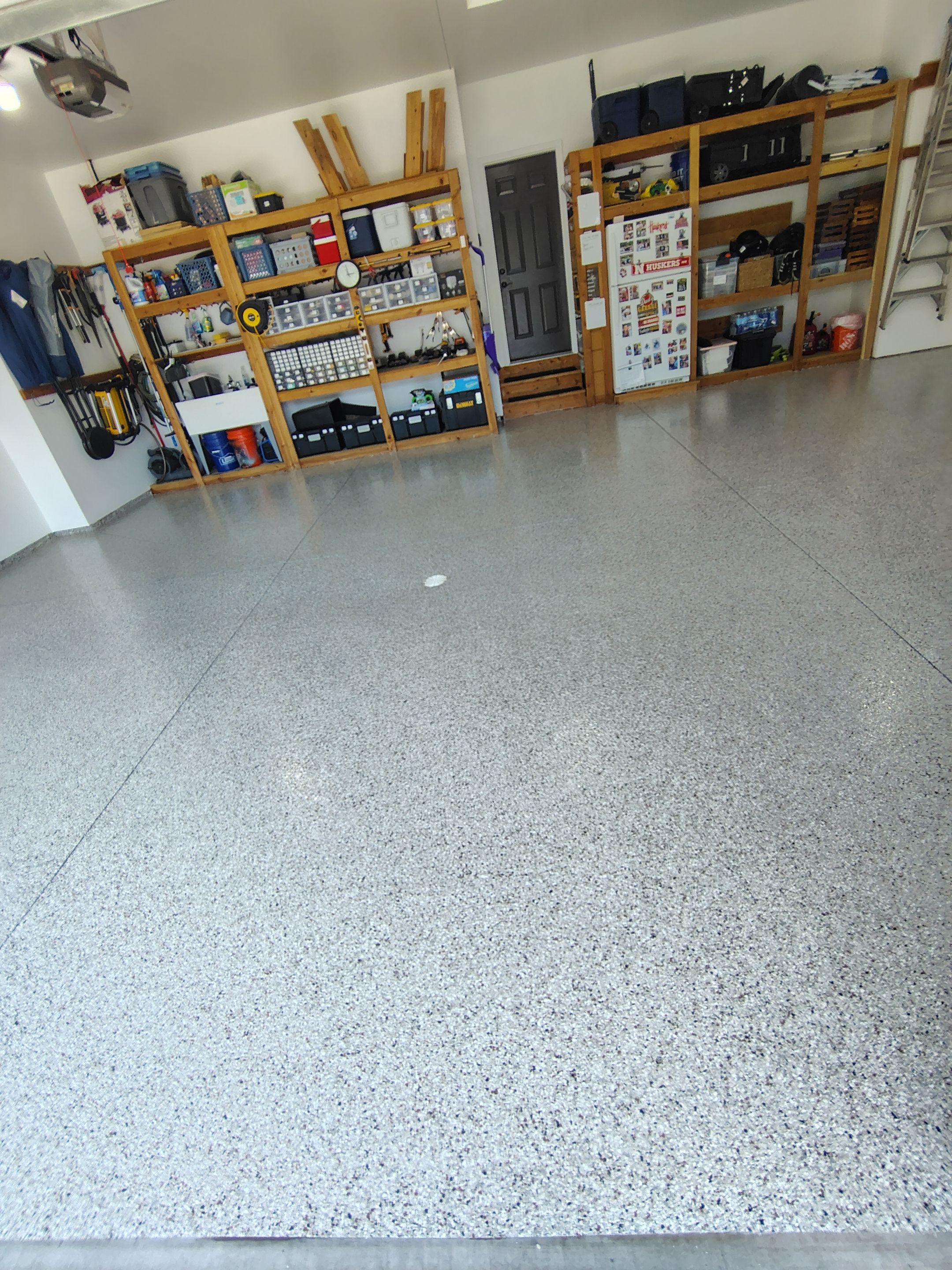 Coyote Garage Floor Coating in Sioux Falls by Select Painting, Coatings & Garage Cabinets