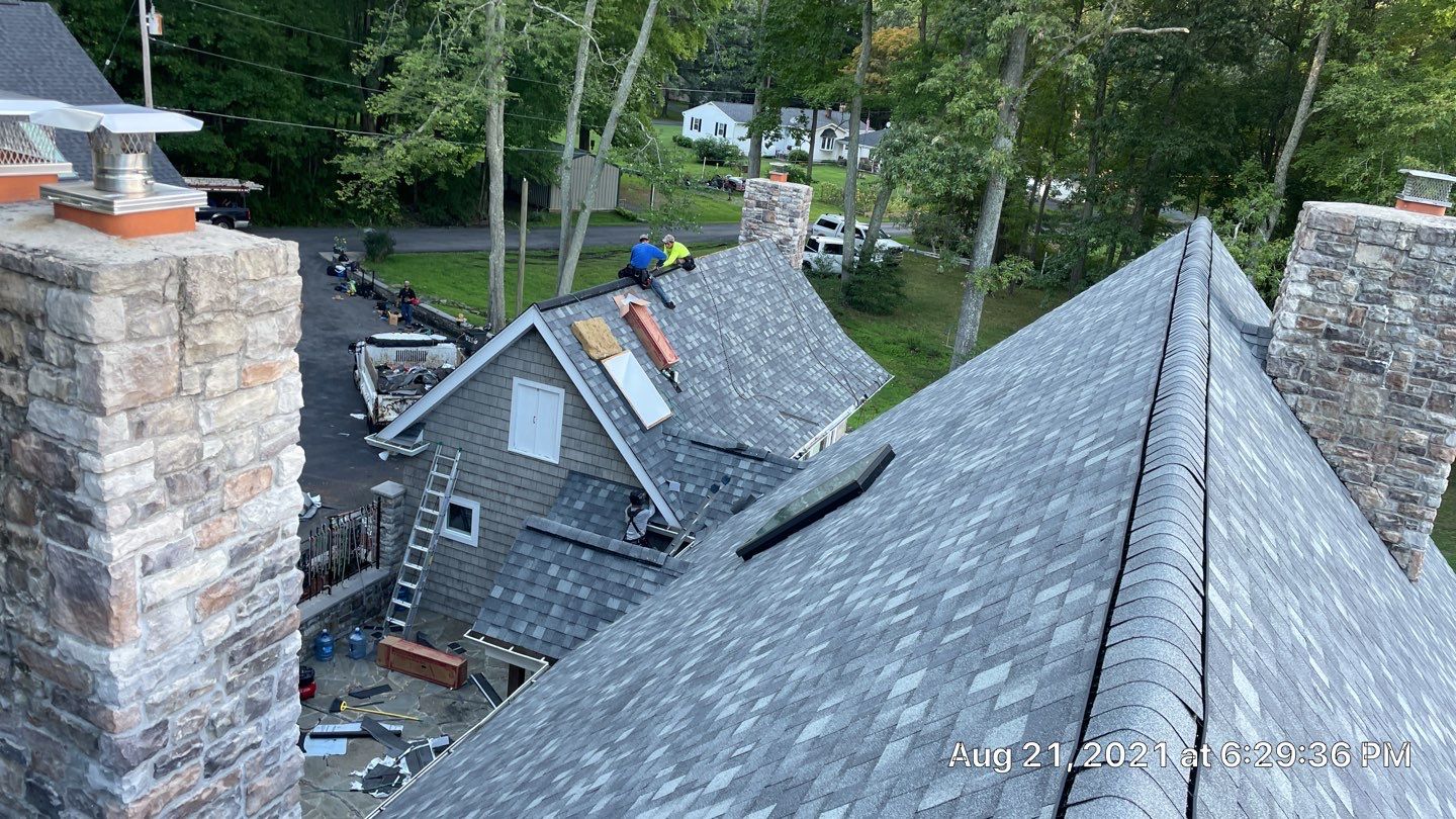 Roof Replacement using IKO Dynasty by American Home Contractors