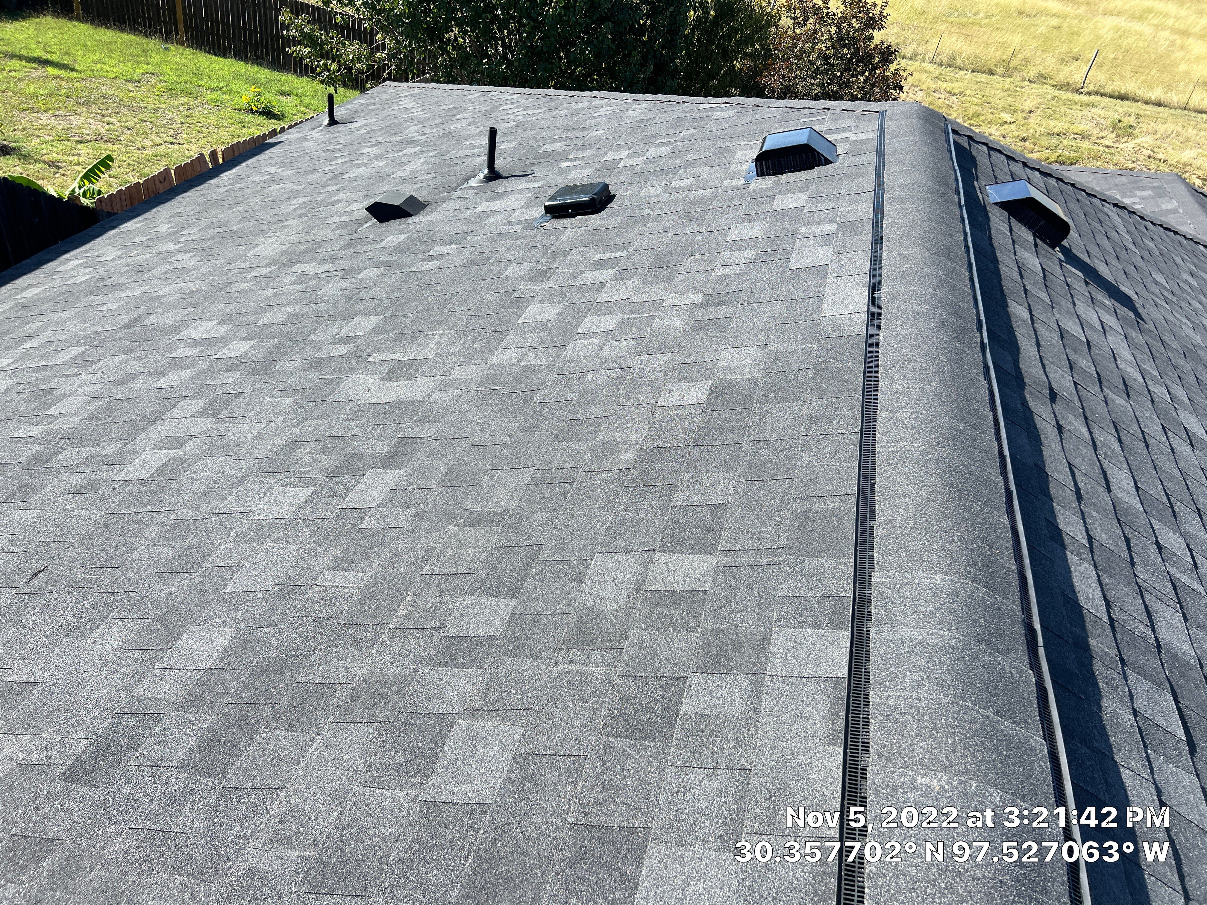 Asphalt Shingle Roof Replacement and Window Glazing in Manor by Caliber Restoration LLC