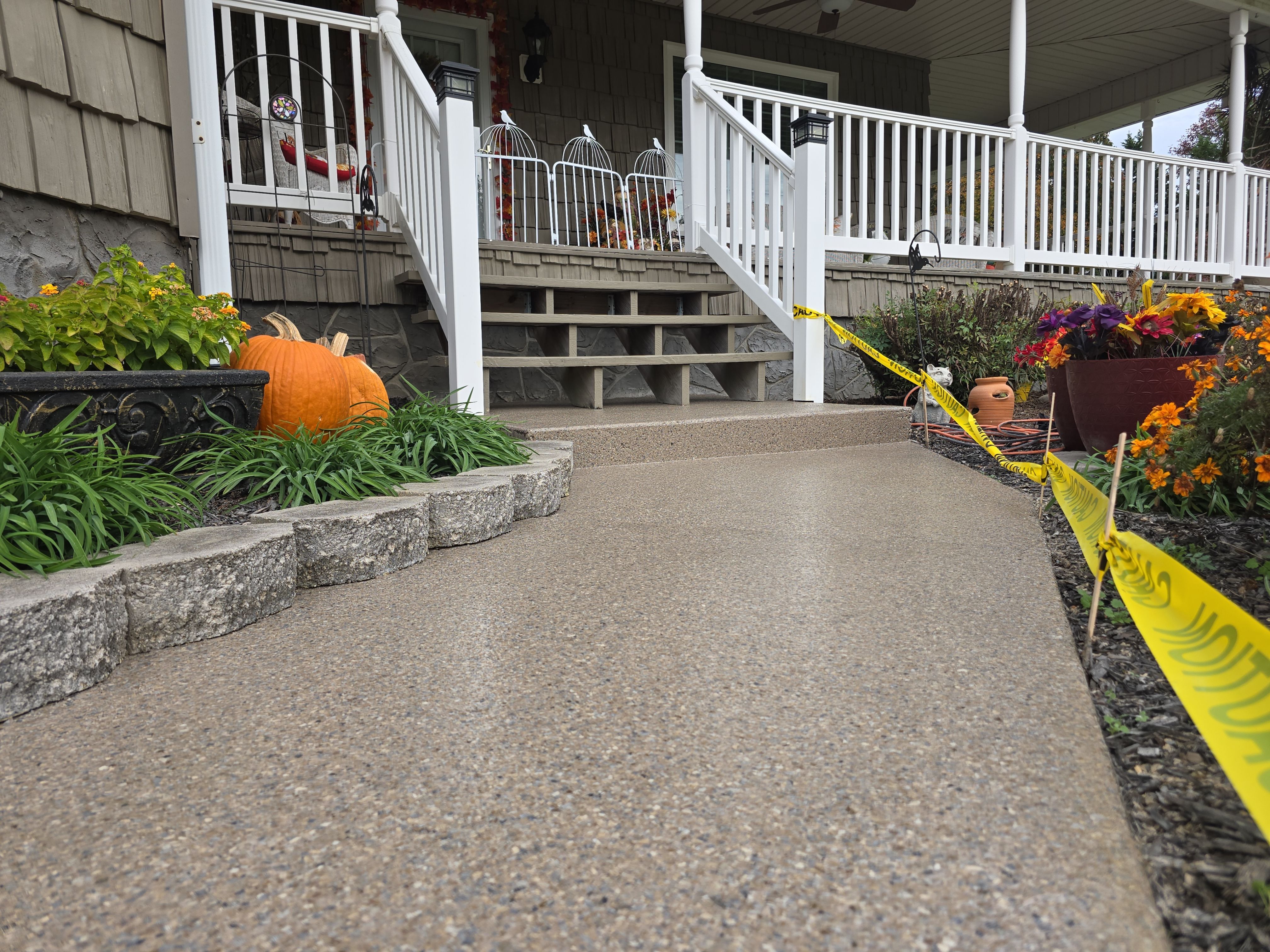 Pool Deck & Sidewalk using Quicksand & Obsidian by Elite Floor Solutions